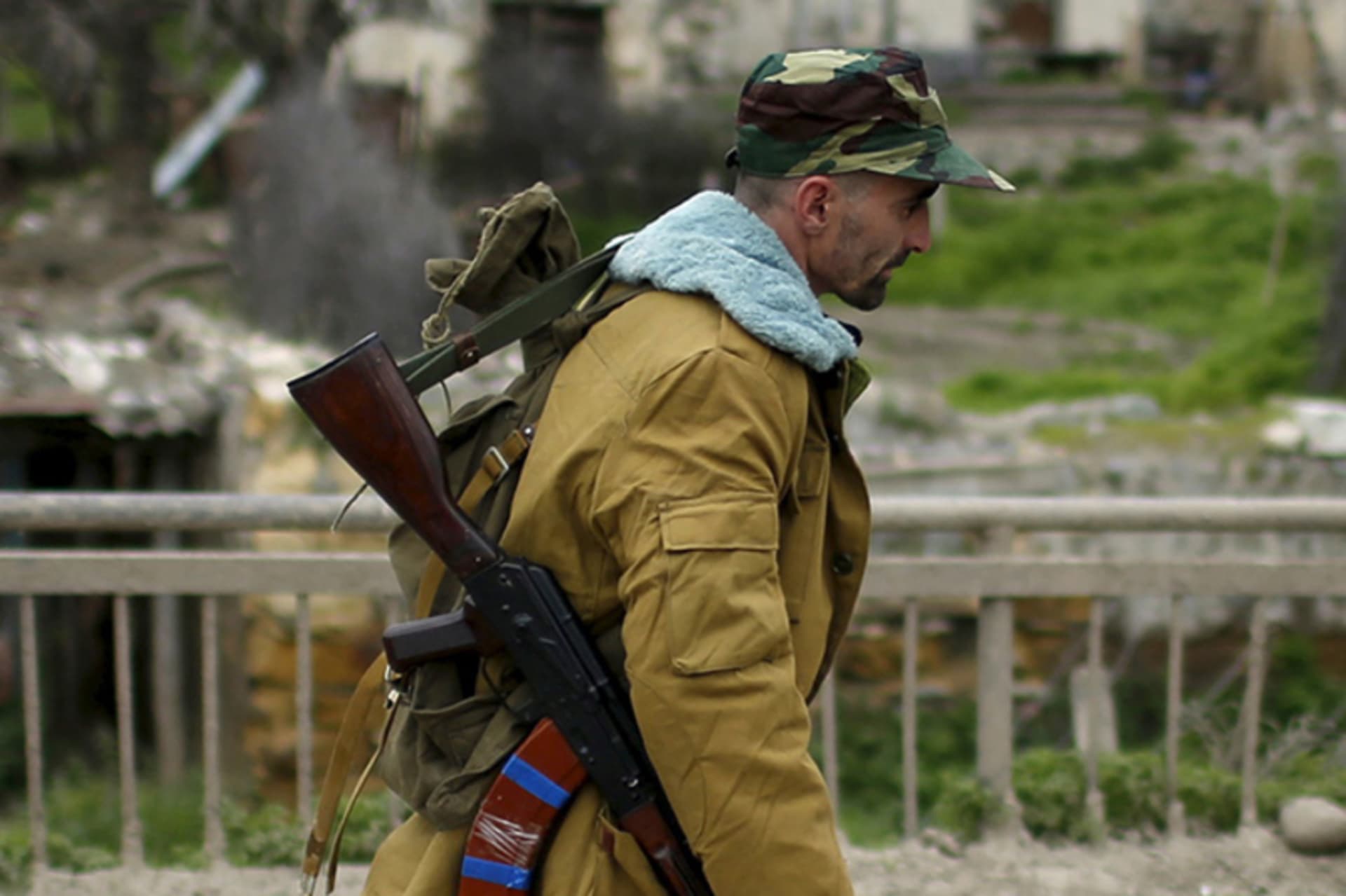 <p>A volunteer walks on a road in the Nagorno-Karabakh’s village of Talish on April 6, 2016.</p>
