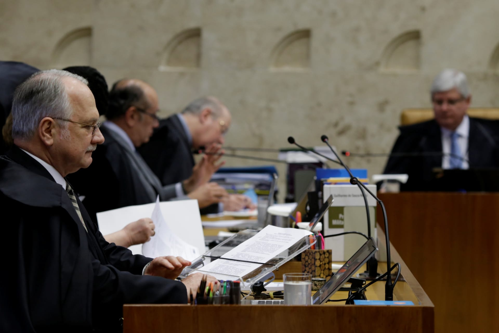 <p>Minister of the Supreme Court, Edson Fachin (L), attends a Supreme Court session in Brasilia, Brazil, on March 15, 2017.</p>