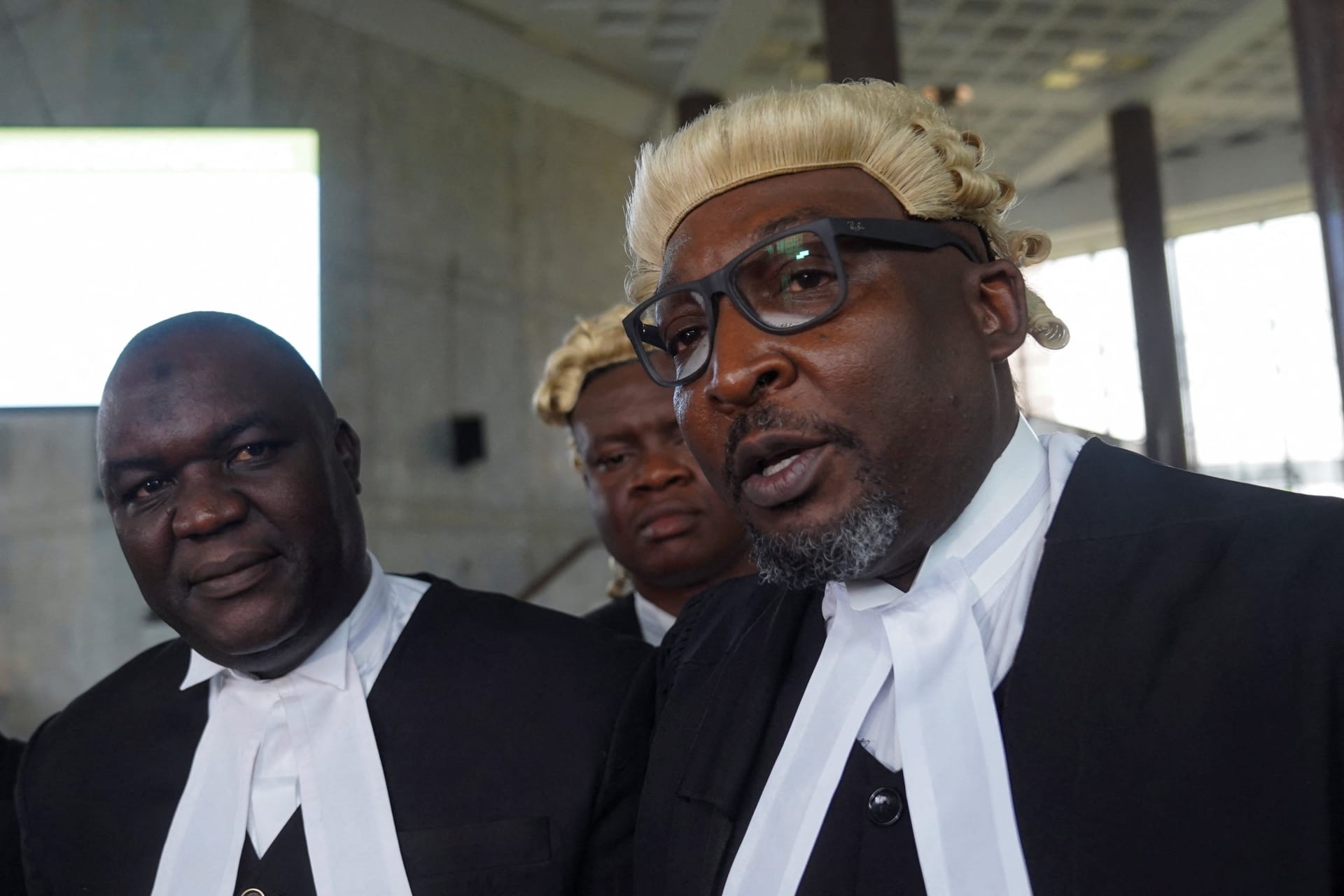 <p>Lamido Abba Sorondinki, counsel for the Kano State government, and Kola Alapinni, legal counsel to Yahaya Sharif-Aminu, speak to the press after last week’s court hearing in Abuja, Nigeria, on September 25, 2025.</p>
