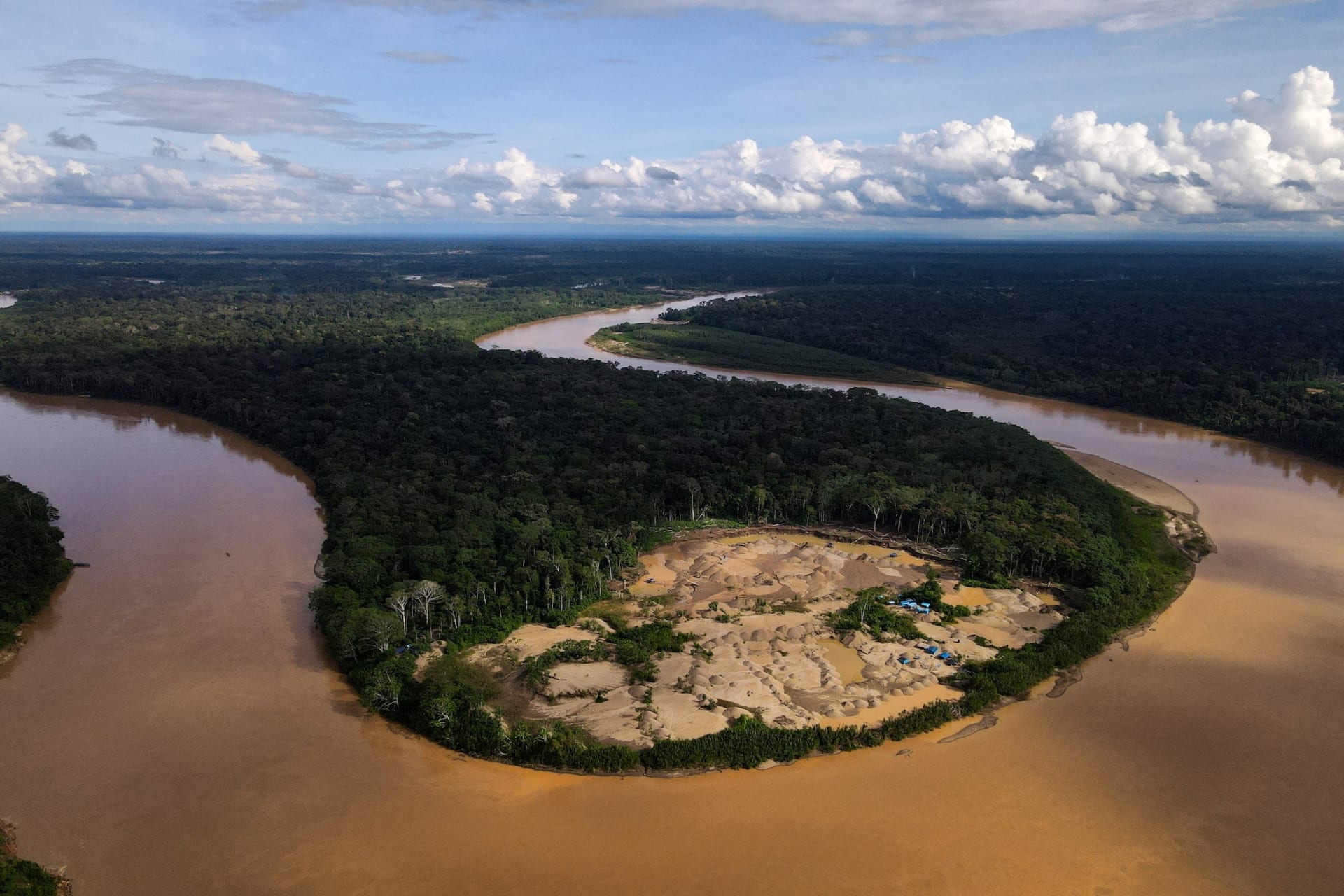 A camp of informal gold miners is pictured in Los Amigos, in the Madre de Dios region, Peru May 22, 2023