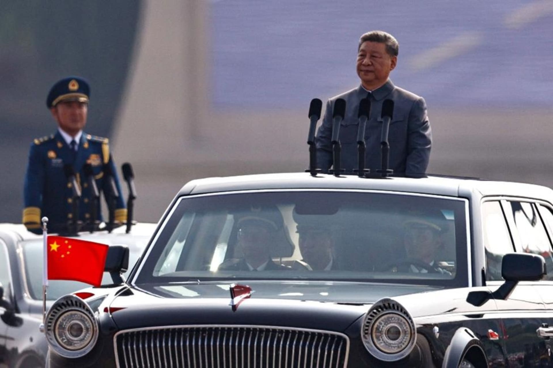 <p>Chinese President Xi Jinping stands in a car to review troops during a military parade to mark the 80th anniversary of the end of World War Two, in Beijing, China on September 3, 2025.</p>
