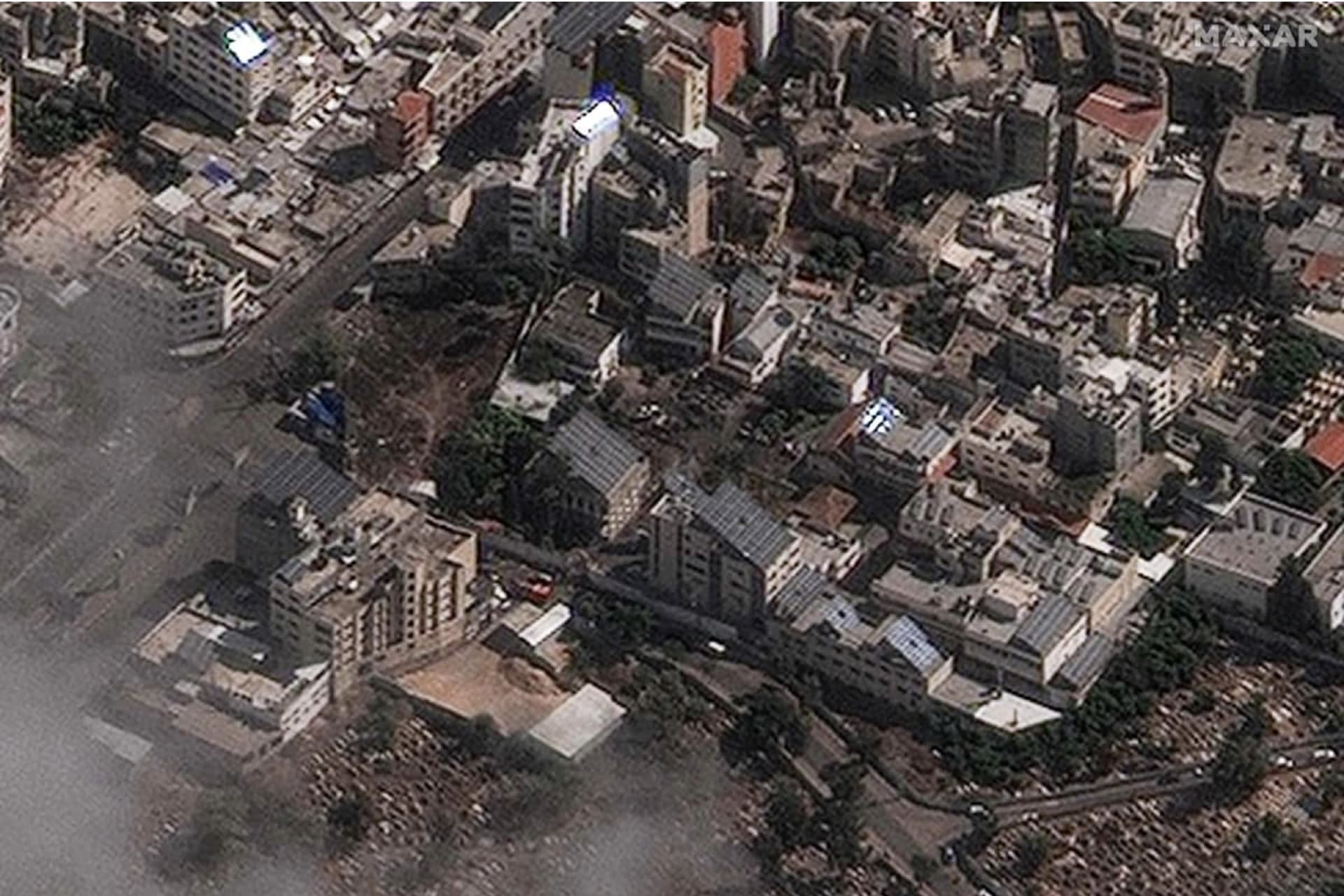 <p>A satellite picture taken on Oct. 18 shows the aftermath of a strike on al-Ahli hospital and the surrounding area in Gaza City, on Oct. 17.</p>
