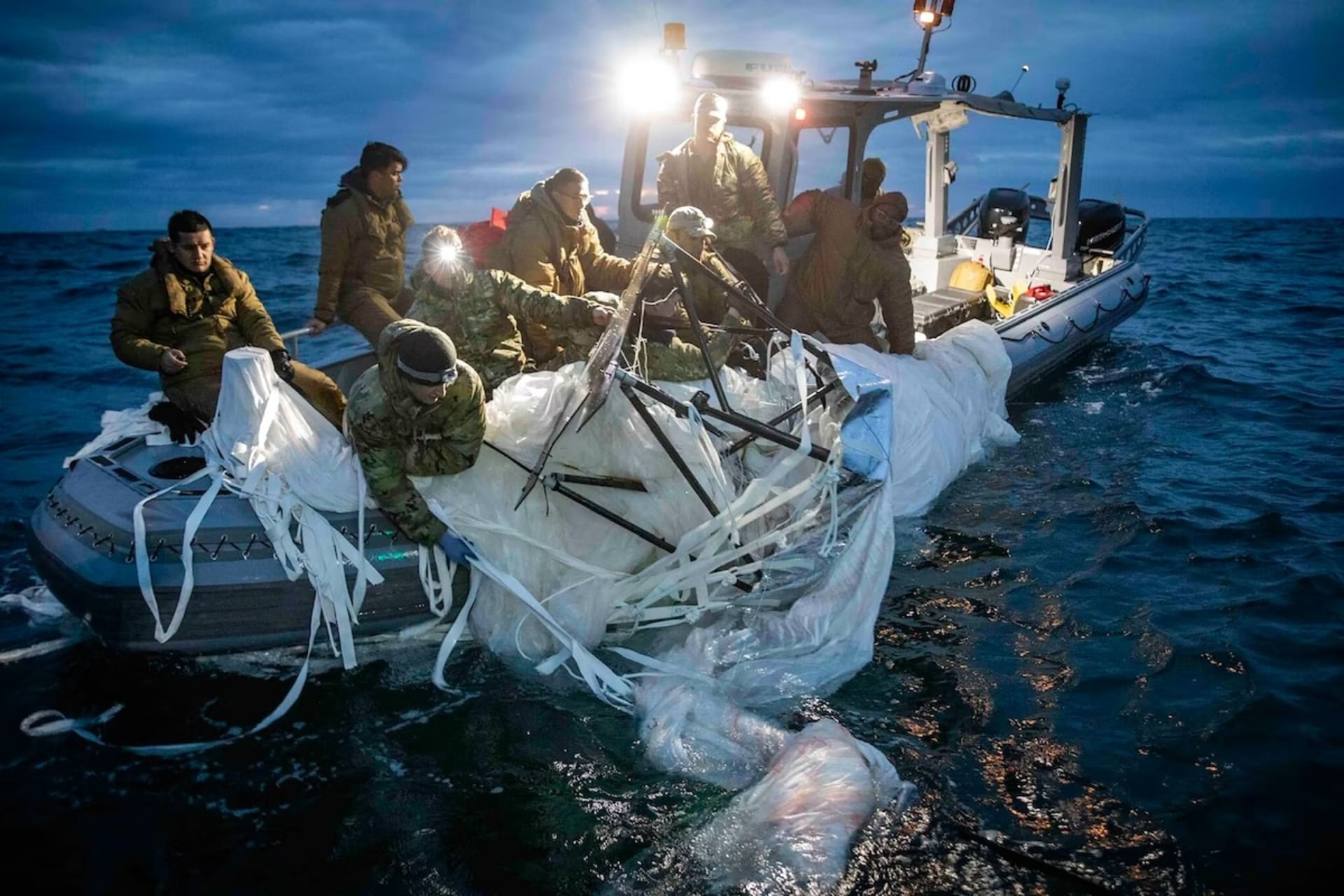 <p>Sailors assigned to Explosive Ordnance Disposal Group 2 recover a high-altitude surveillance balloon off the coast of Myrtle Beach, S.C., on Feb. 5. </p>
