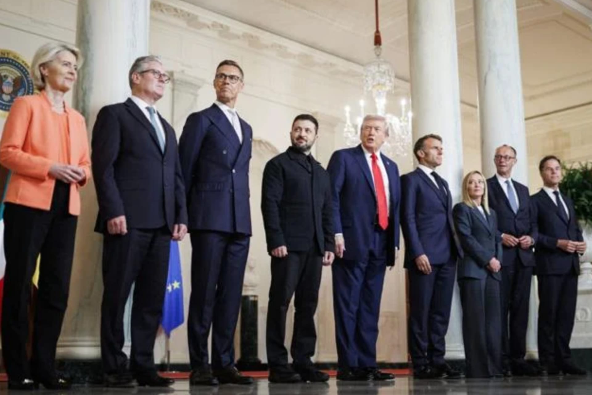 <p>President Donald Trump and Ukraine President Volodymyr Zelenskyy pose for a photo with European and NATO leaders on Monday inside the Cross Hall at the White House.</p>
