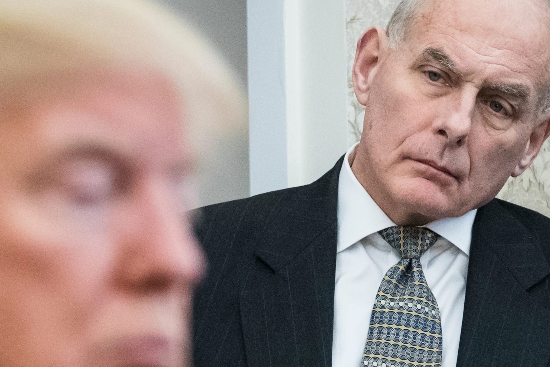 <p>White House Chief of Staff John Kelly watches as President Donald Trump speaks during a meeting with North Korean defectors in the Oval Office at the White House on Feb. 2, 2018.</p>
