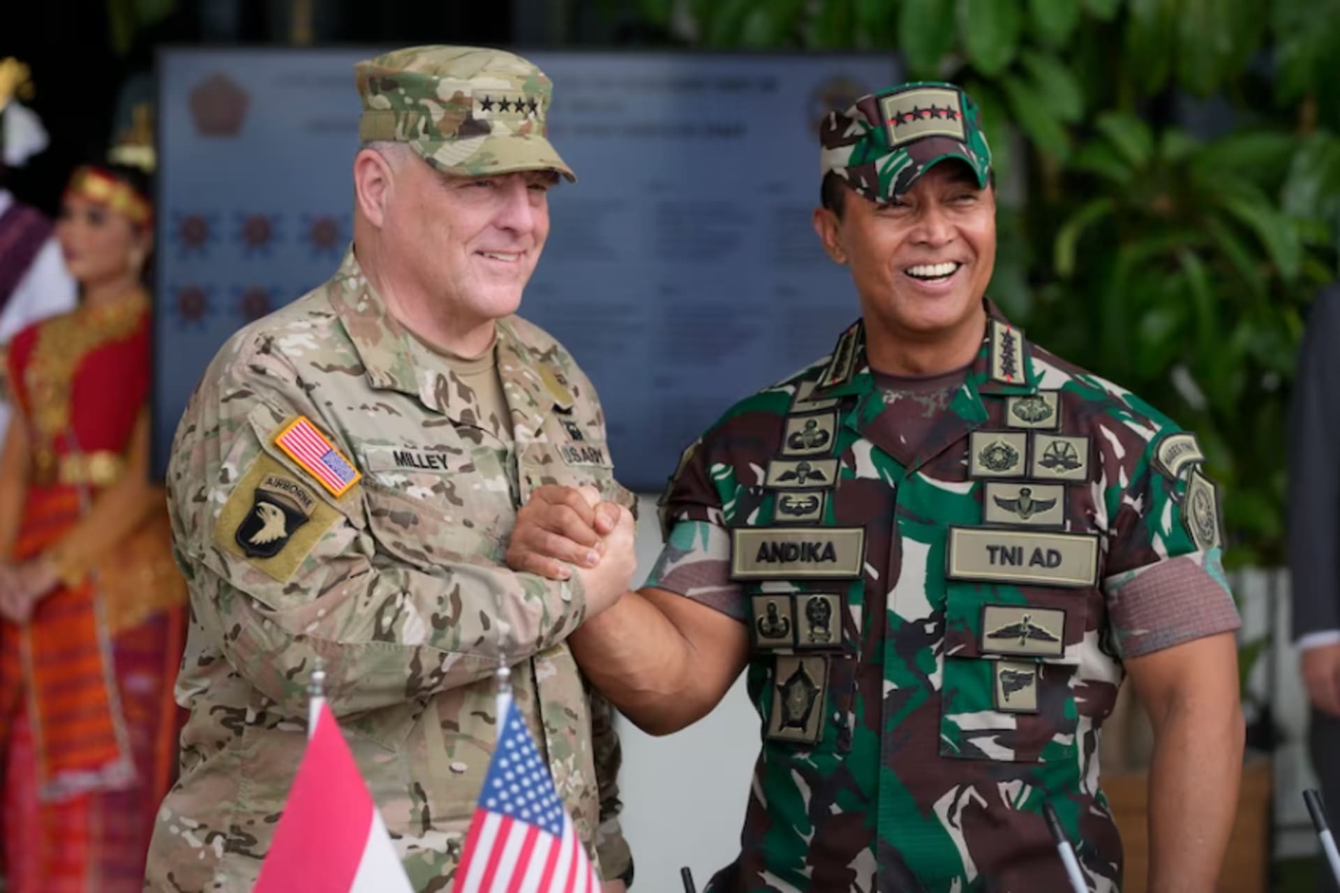 <p>U.S. Chairman of the Joint Chiefs of Staff Gen. Mark Milley, left, shakes hands with Indonesian Armed Forces Chief Gen. Andika Perkasa at Indonesian military headquarters in Jakarta on July 24.</p>
