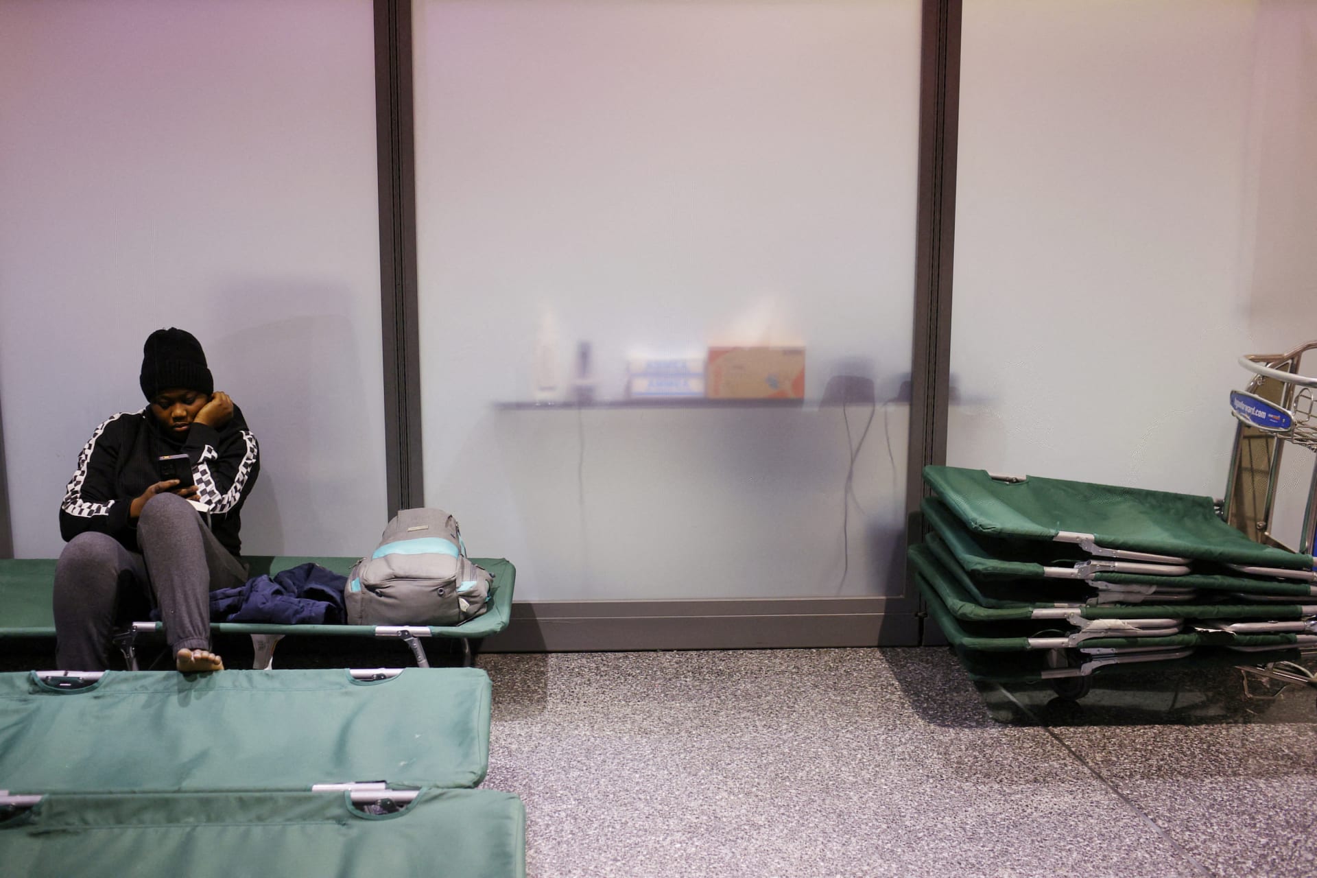 Photo of Haitian migrant at Logan International Airport