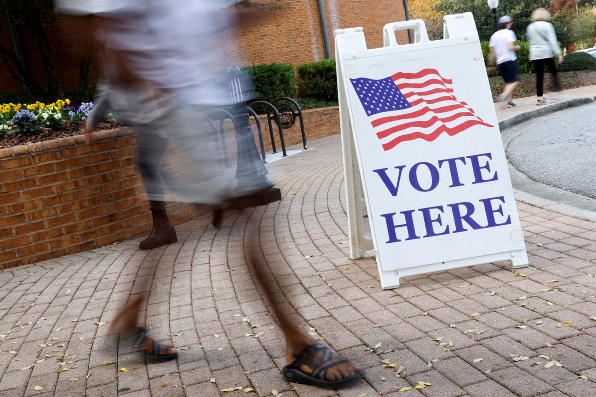 <p>People visit an early voting location during midterm Congressional and state governor elections at the Smyrna Community Center in Smyrna, Georgia.</p>
