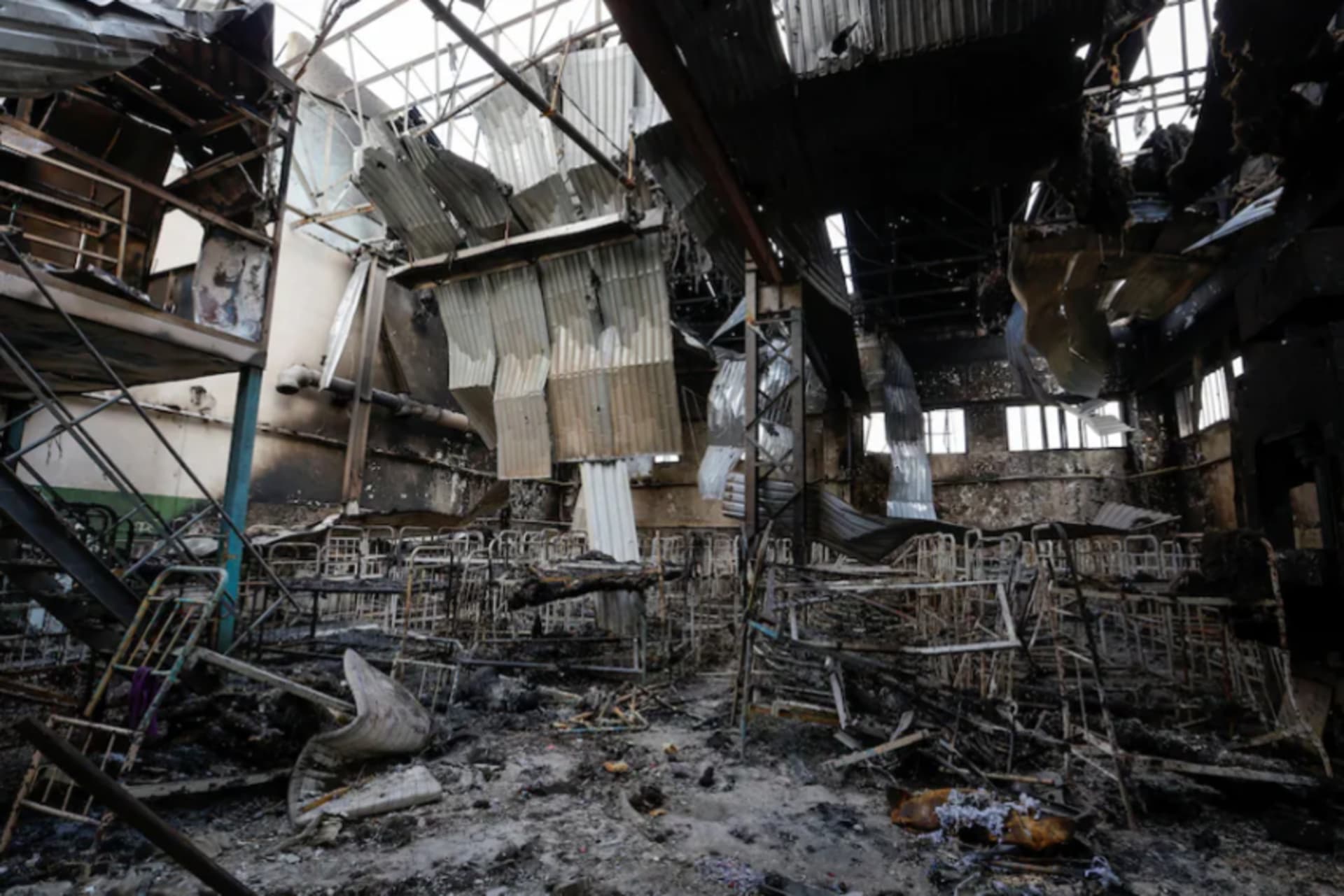 The aftermath of a strike on a detention center in eastern Ukraine that killed more than 50 Ukrainian prisoners of war on July 29.