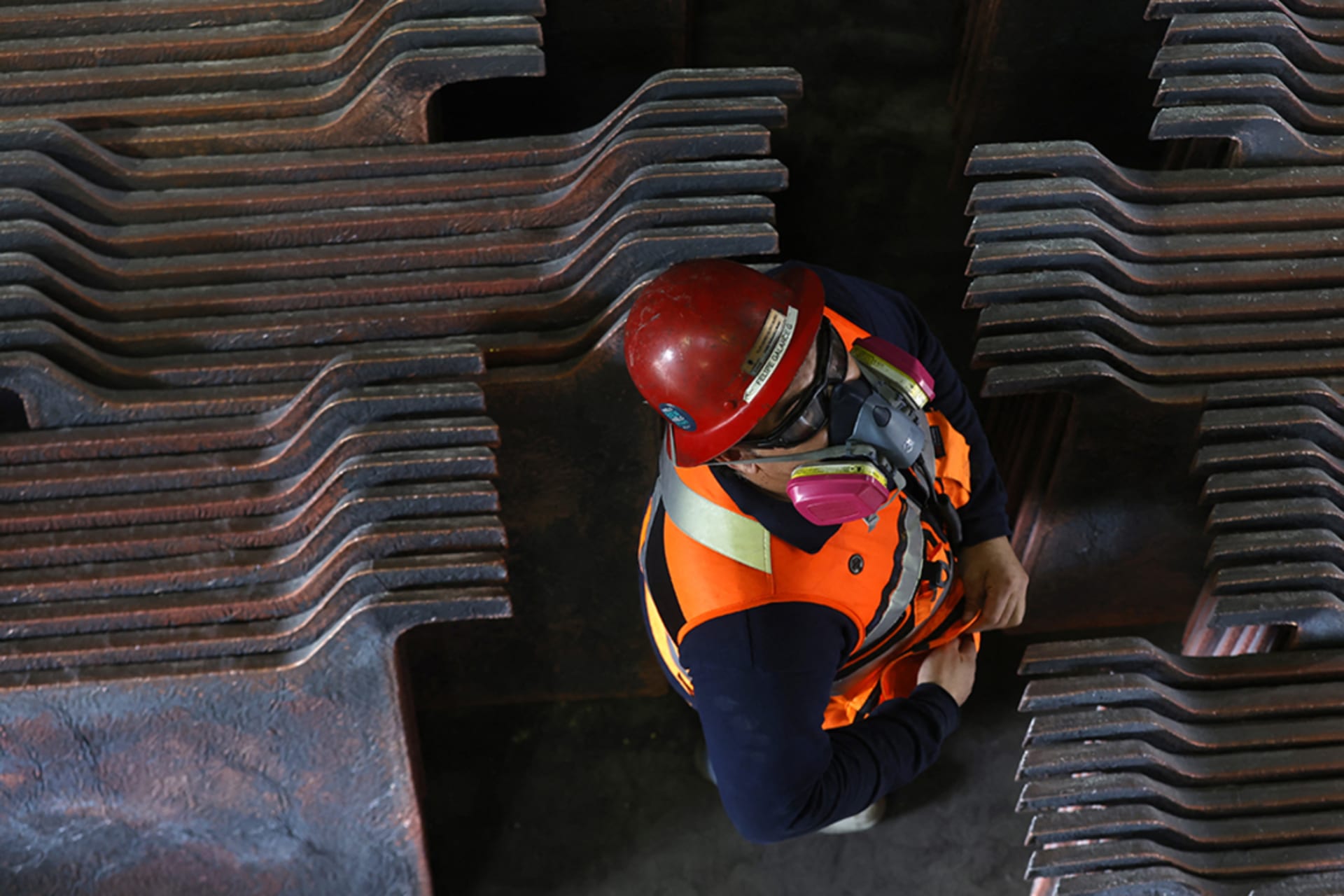 <p>A miner stands among copper production at El Teniente mine, the world’s largest underground copper mine in Machali, near Rancagua, Chile, on April 2.</p>
