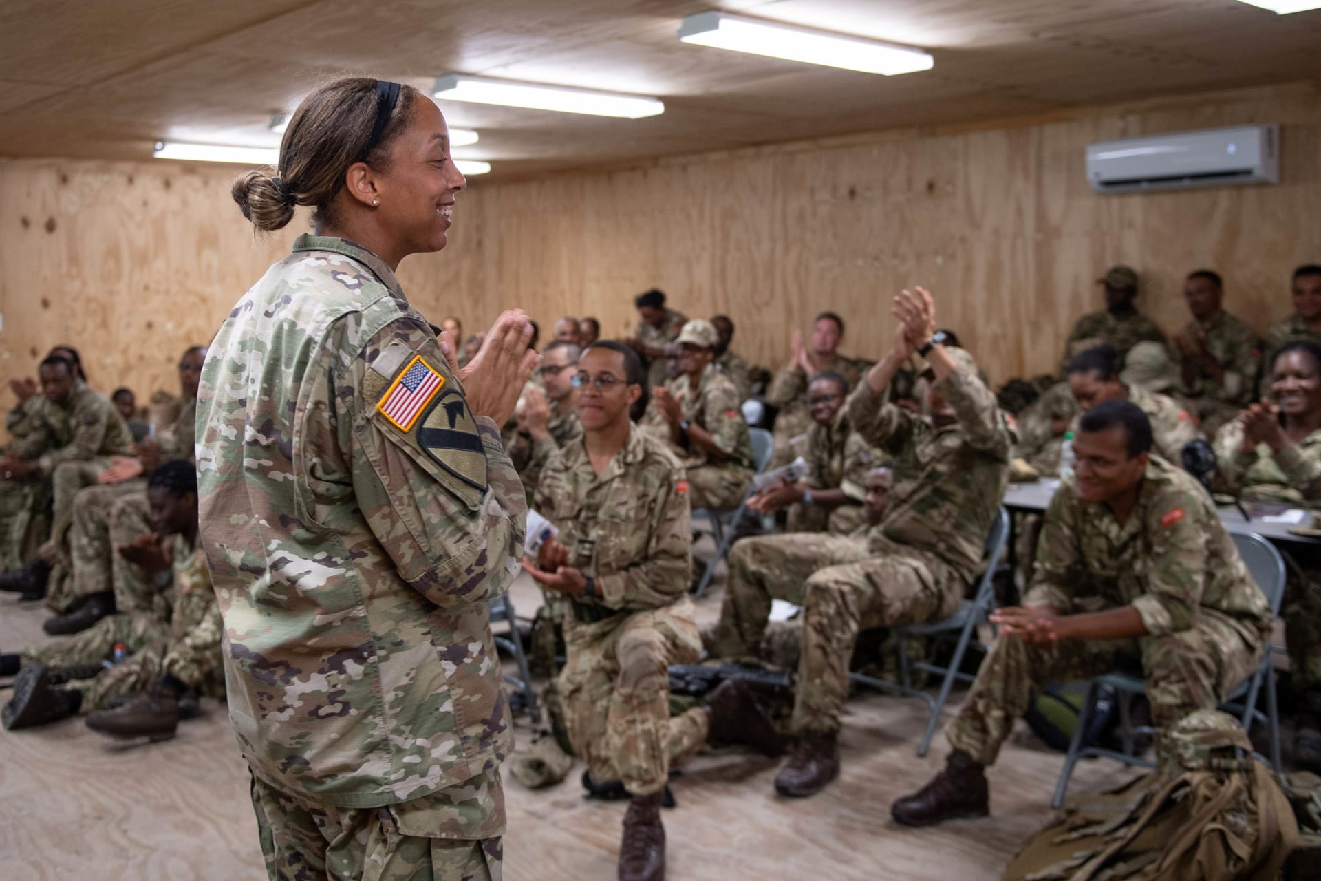 <p>Major Tiffani Summers, Public Affairs officer from US Army, interacts with the troops from over twenty countries during a women, peace and security briefing as part of Exercise TRADEWINDS at Camp Seweyo, Guyana on 19 July 23.</p>

