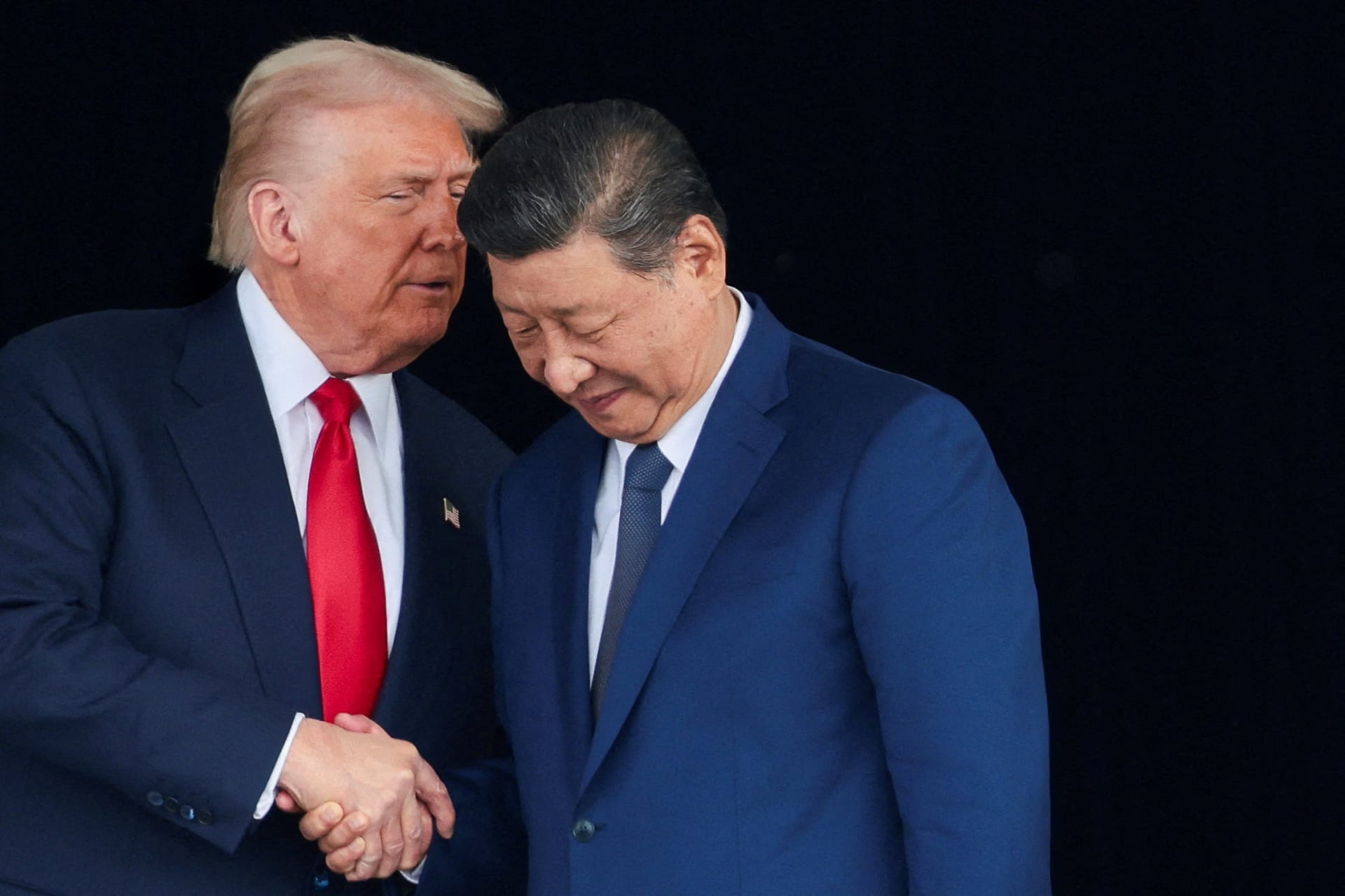 <p>U.S. President Donald Trump and Chinese President Xi Jinping talk as they leave after a bilateral meeting at Gimhae International Airport, on the sidelines of the Asia-Pacific Economic Cooperation (APEC) summit, in Busan, South Korea, October 30, 2025. </p>
