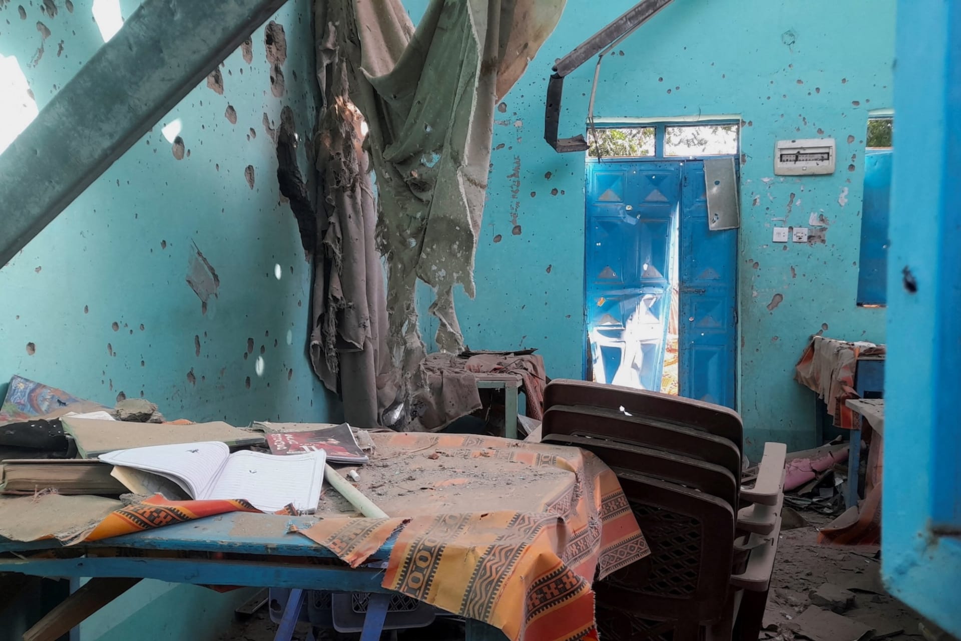<p> A desk bearing signs of shelling in a school where displaced people are sheltering in El Fasher, Sudan on October 7, 2025. </p>
