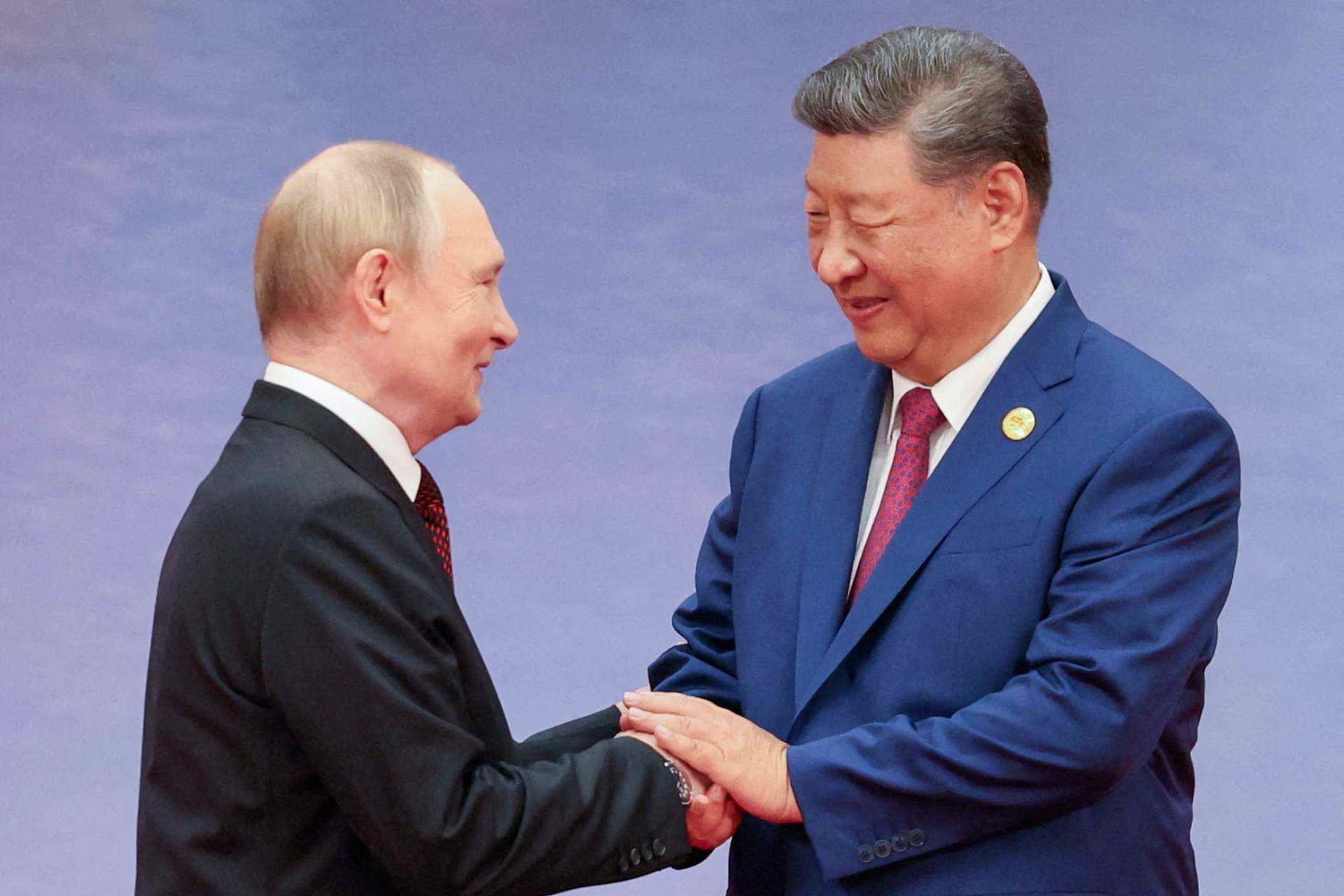 <p>Chinese President Xi Jinping welcomes Russian President Vladimir Putin at the Shanghai Cooperation Organization Summit in Tianjin, China.</p>
