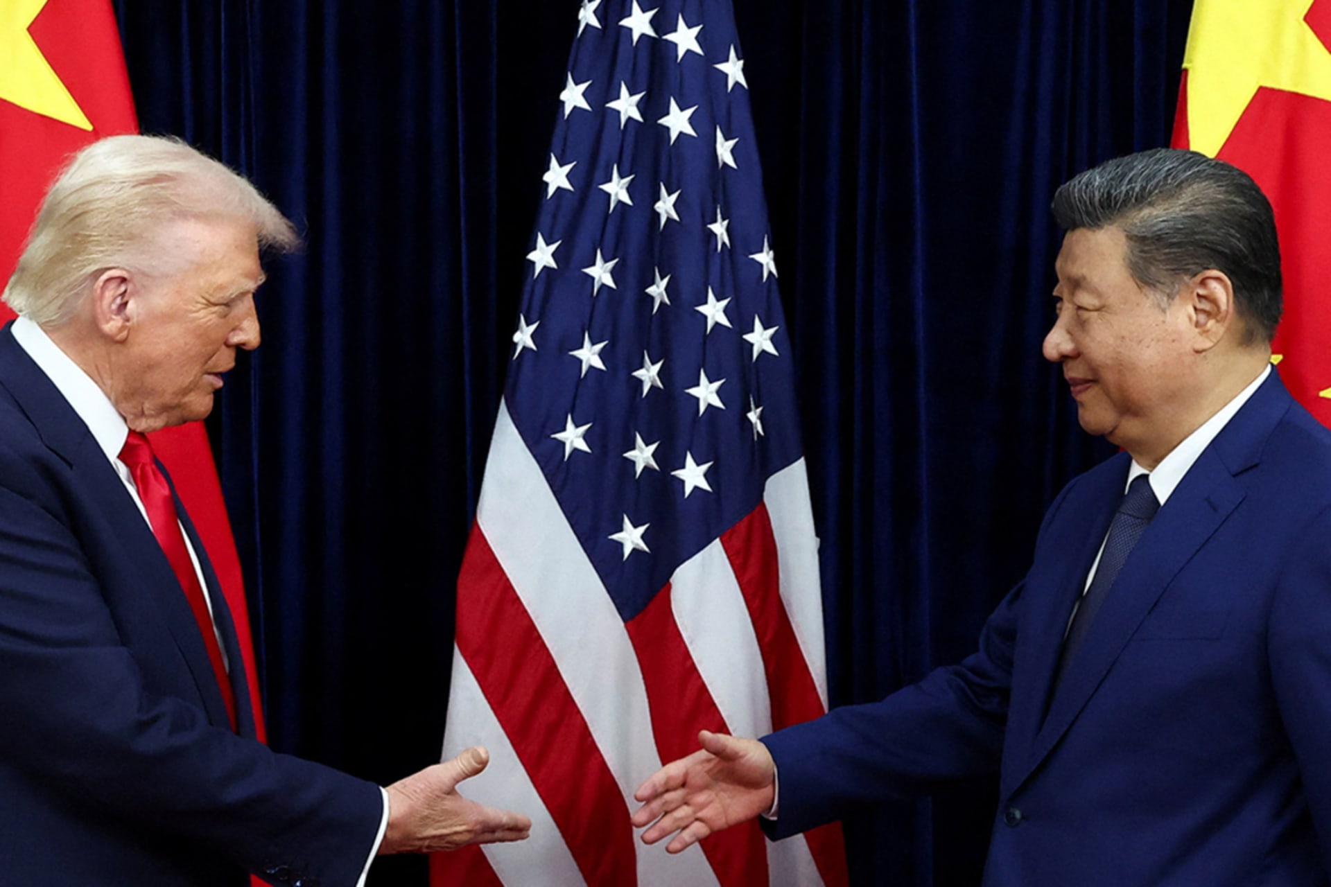 <p>U.S. President Donald Trump shakes hands with Chinese President Xi Jinping as they hold a bilateral meeting at Gimhae International Airport, on the sidelines of the Asia-Pacific Economic Cooperation (APEC) summit, in Busan, South Korea, October 30, 2025.</p>
