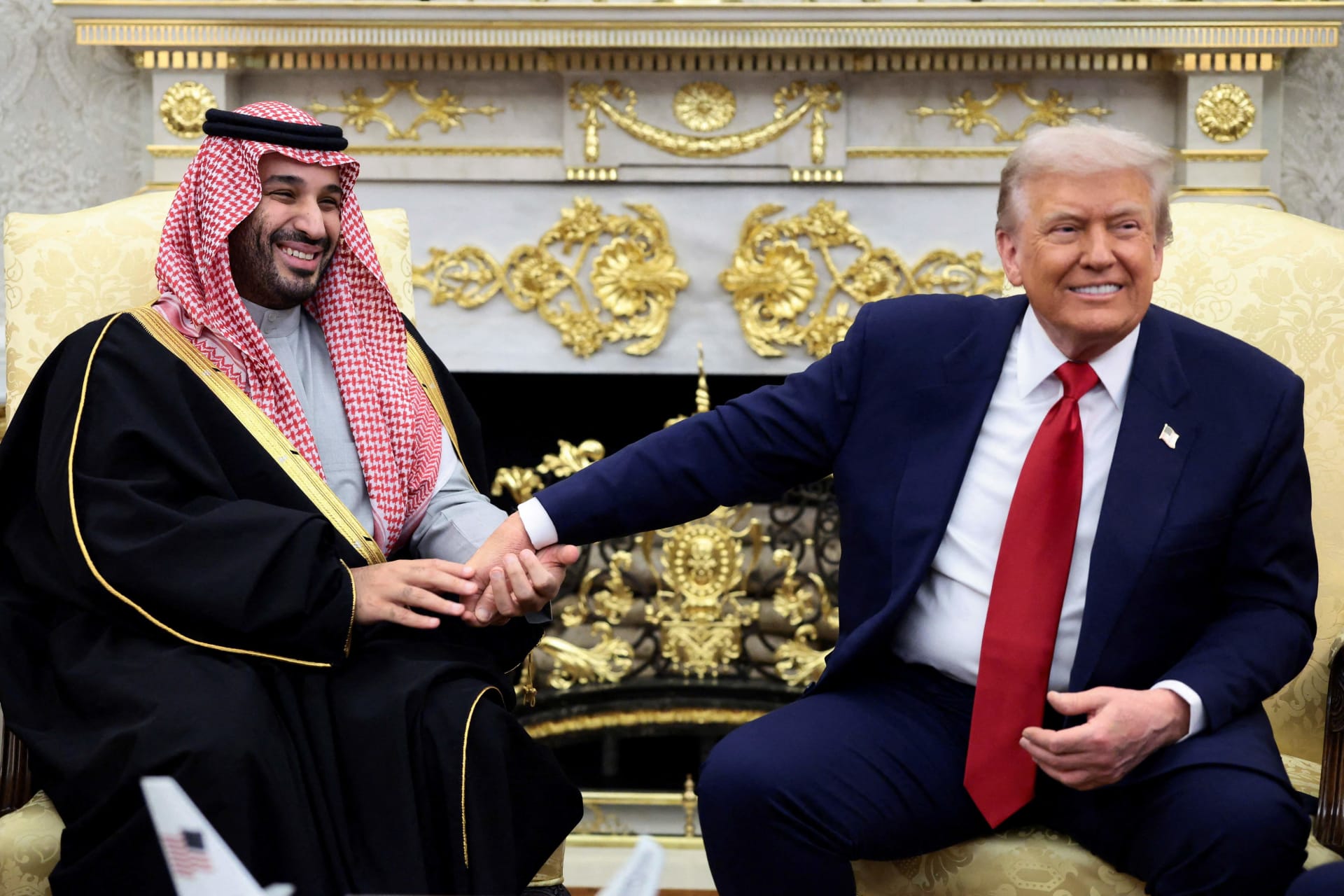<p>Saudi Crown Prince Mohammed bin Salman holds U.S. President Donald Trump’s hand during a meeting at the White House in Washington, DC, November 18, 2025.</p>
