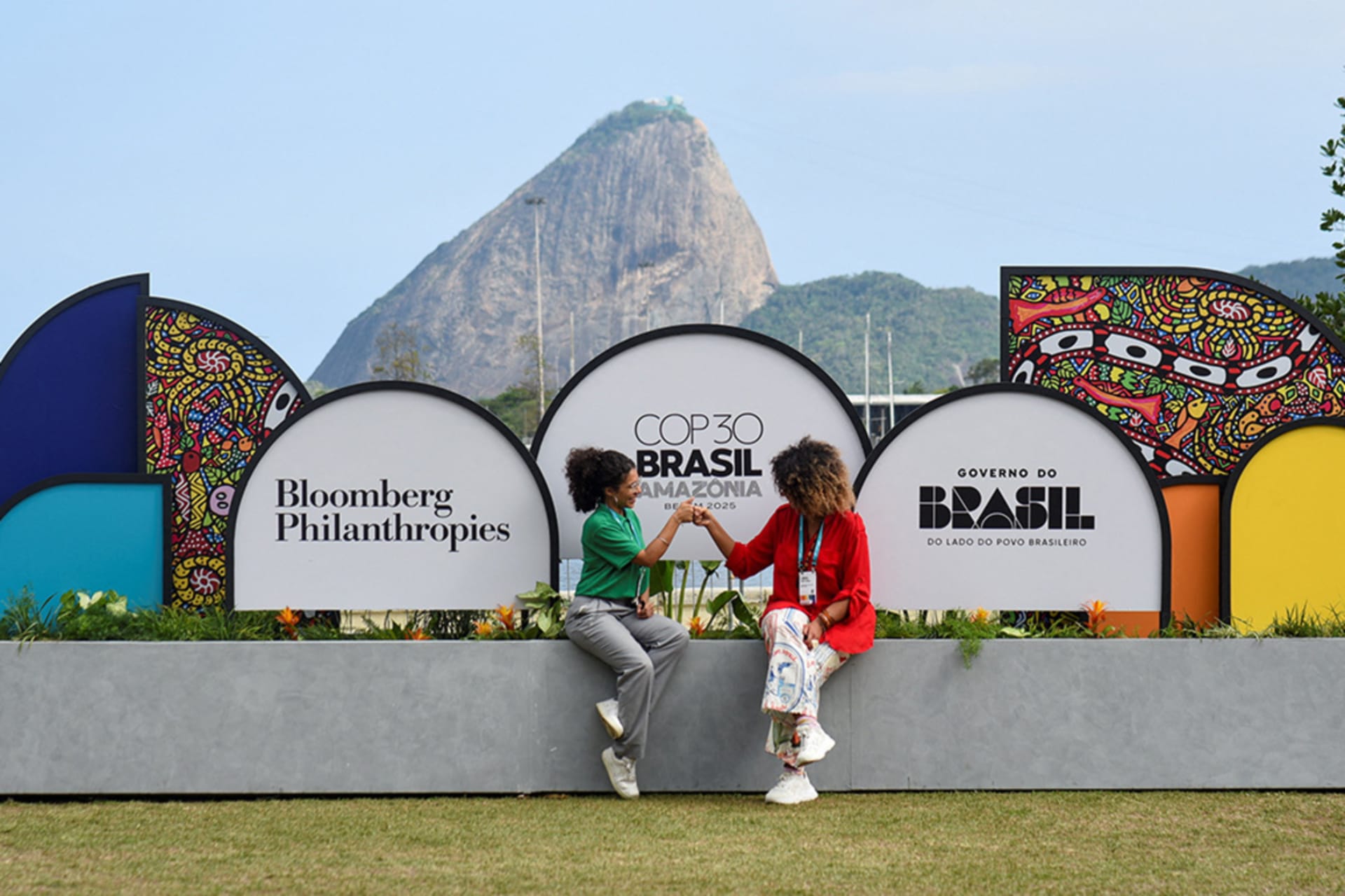 <p>People sit near COP30 signage at the Museum of Modern Art in Rio de Janeiro, Brazil, November 4, 2025.</p>

