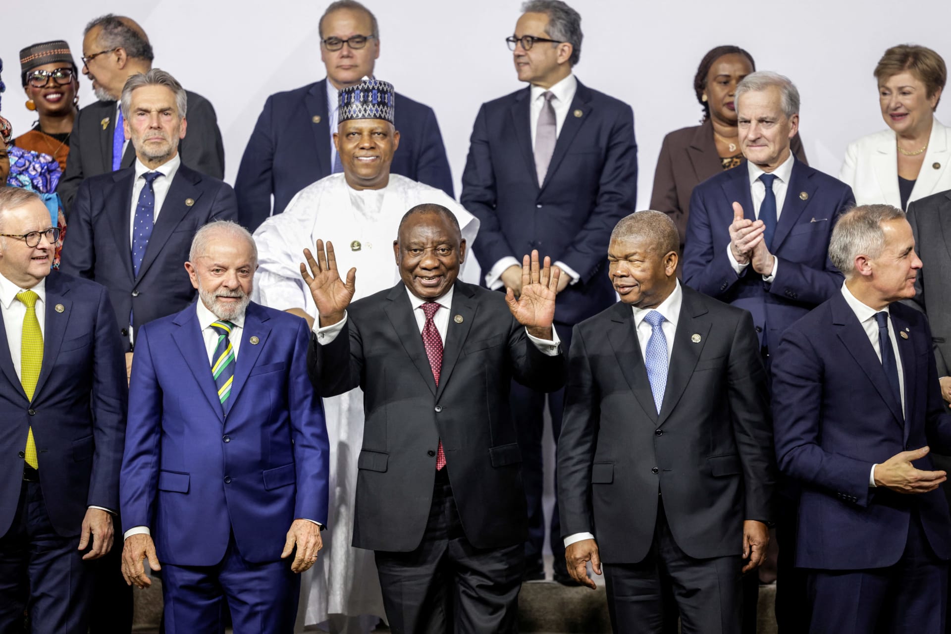 <p>World leaders, including South African President Cyril Ramaphosa, react as they attend a family photo event during a G20 Leaders’ Summit plenary session at the Nasrec Expo Centre in Johannesburg, South Africa, November 22, 2025.</p>
