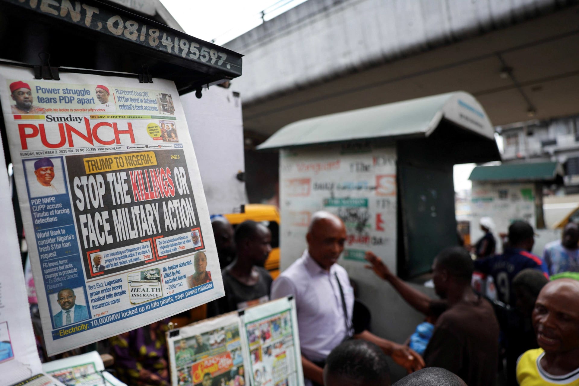 <p>A newspaper with an article reporting U.S. President Donald Trump’s message to Nigeria over the treatment of Christians hangs at a newspaper stand in Ojuelegba, Lagos, Nigeria, on November 2, 2025.</p>
