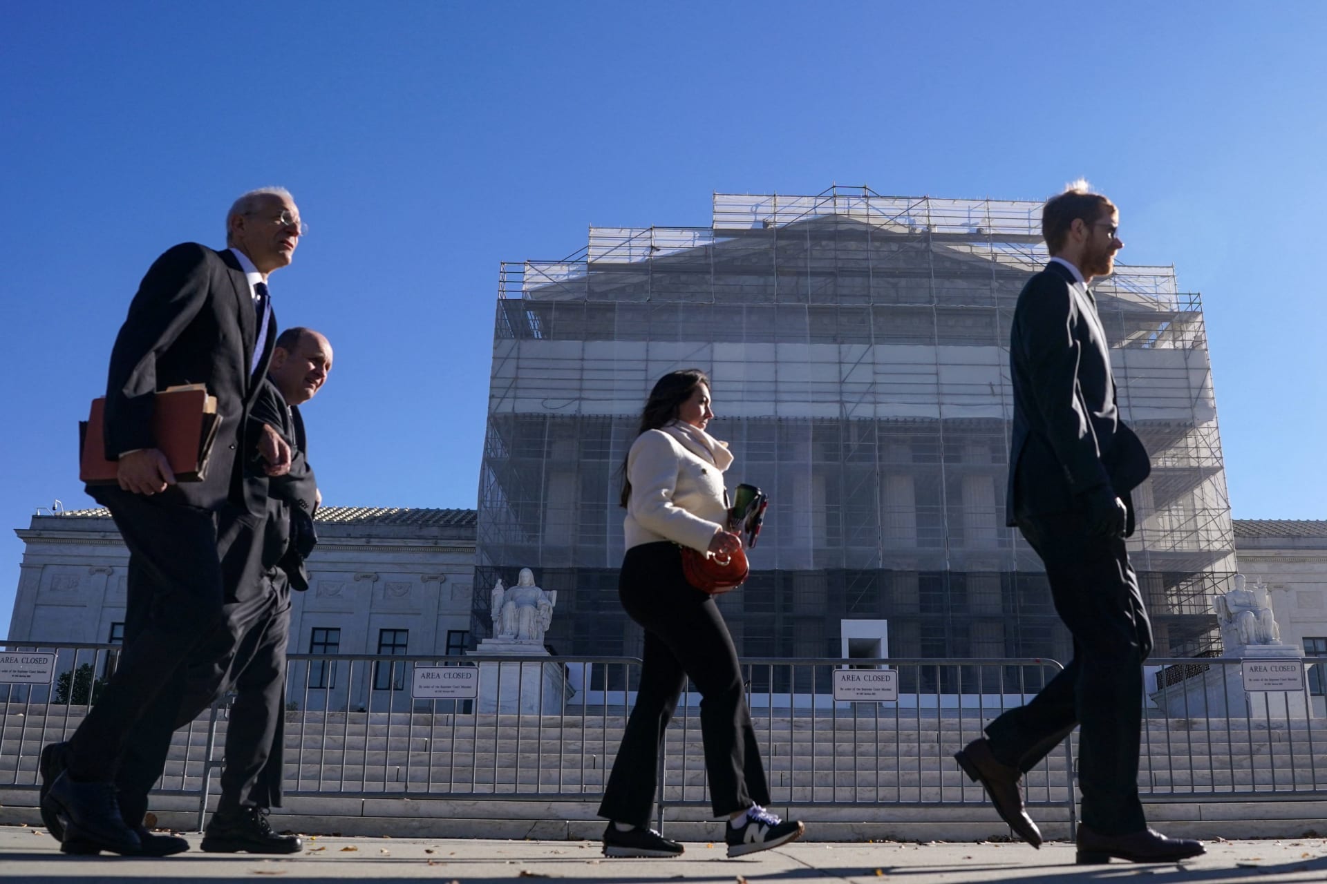 <p>Members of the public walk outside the U.S. Supreme Court to attend oral arguments on U.S. President Donald Trump’s bid to preserve sweeping tariffs after lower courts ruled that Trump overstepped his authority, in Washington, D.C., U.S., November 5, 2025</p>
