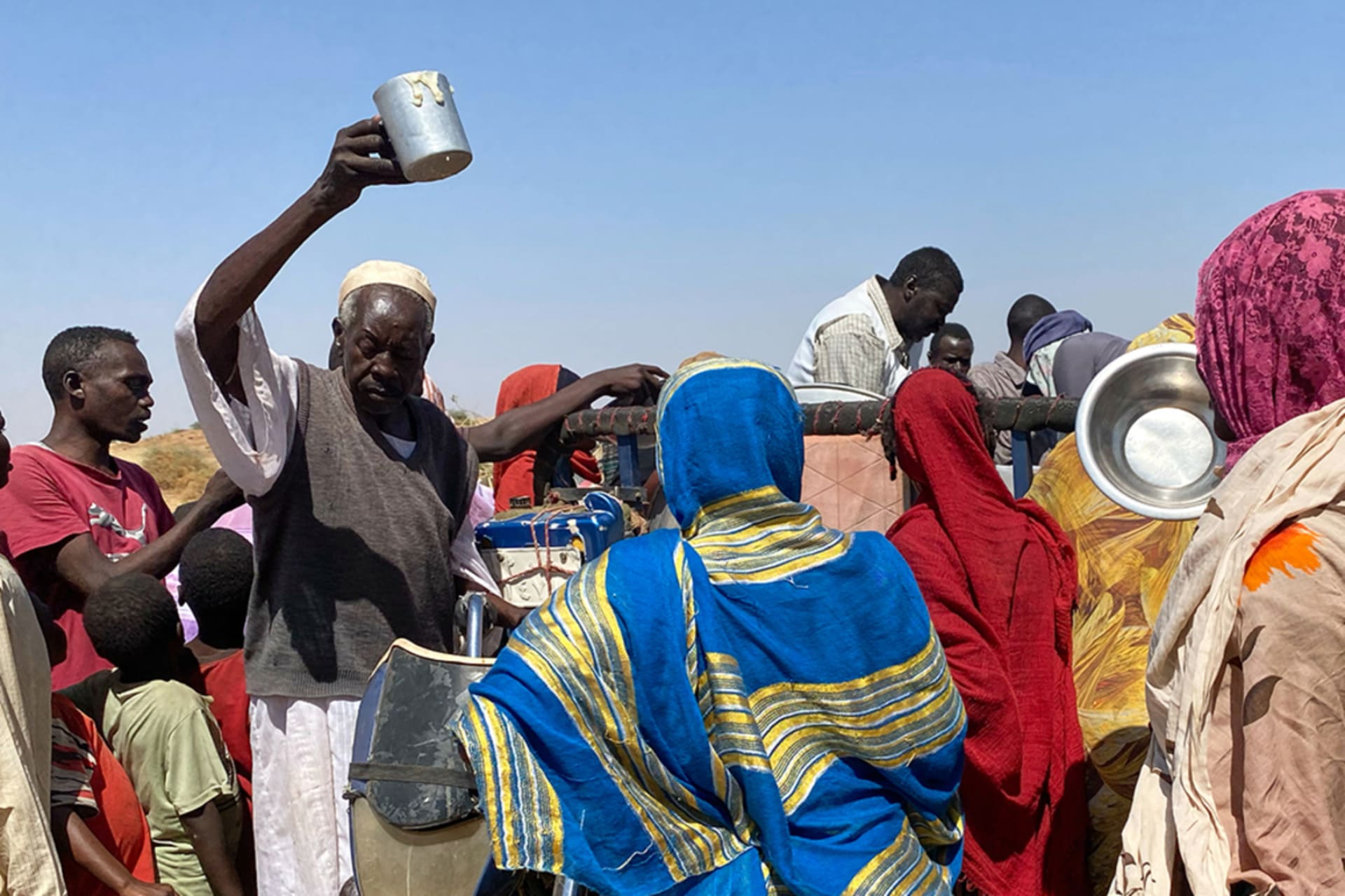 <p>Sudanese who fled El Fasher after paramilitary forces killed hundreds of people in the western Darfur region, crowd to receive food at their camp in Tawila, Sudan, Sunday, Nov. 2, 2025.</p>
