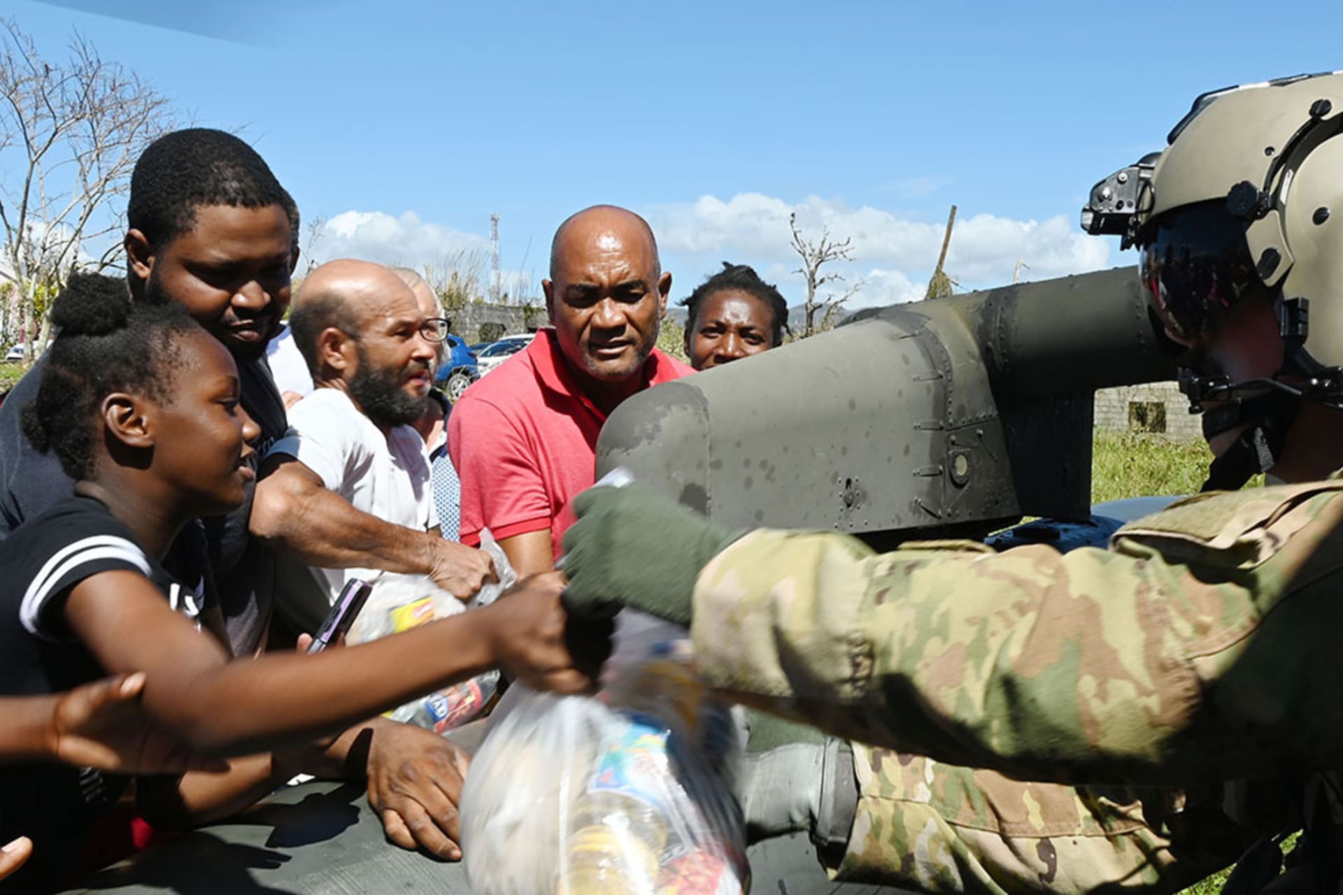 <p>A U.S. Army soldier assigned to the 1st Battalion, 228th Aviation Regiment, Joint Task Force-Bravo distributes food in Amity, Westmoreland Parrish, Jamaica, November 4, 2025.</p>
