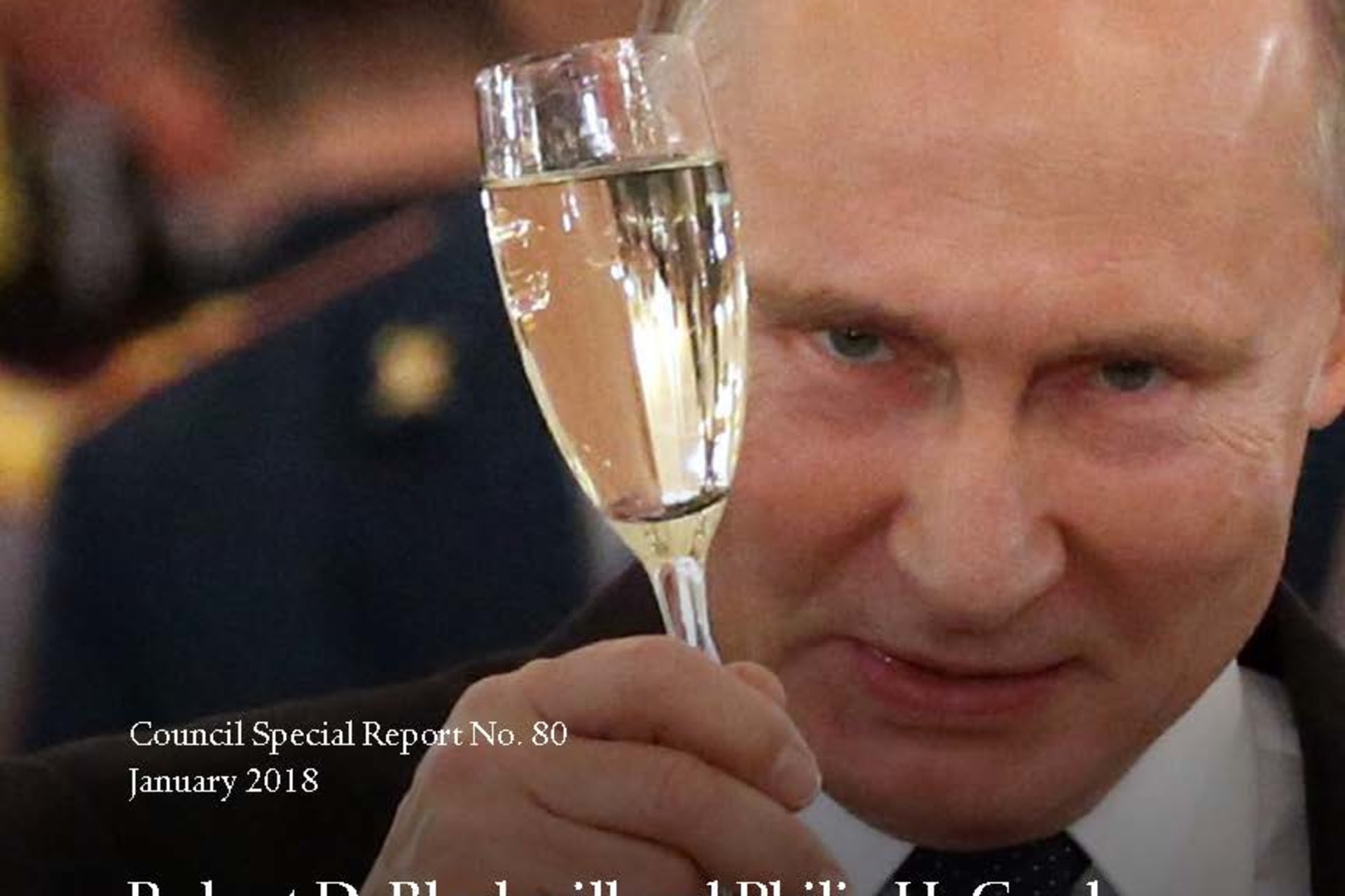 <p>Russian President Vladimir Putin toasts during a reception for military service members at Grand Kremlin Palace in Moscow on December 28, 2017.</p>
