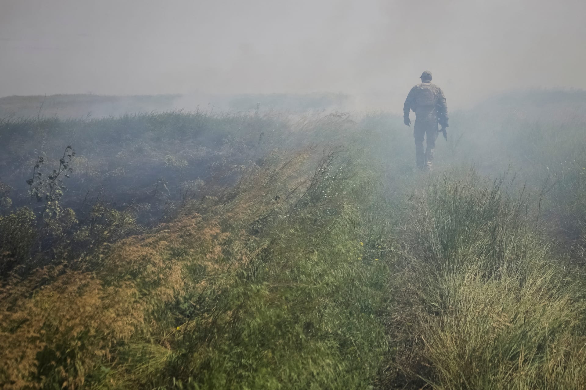 <p>A Ukrainian service member is seen near the front line near the newly liberated village Neskuchne.</p>
