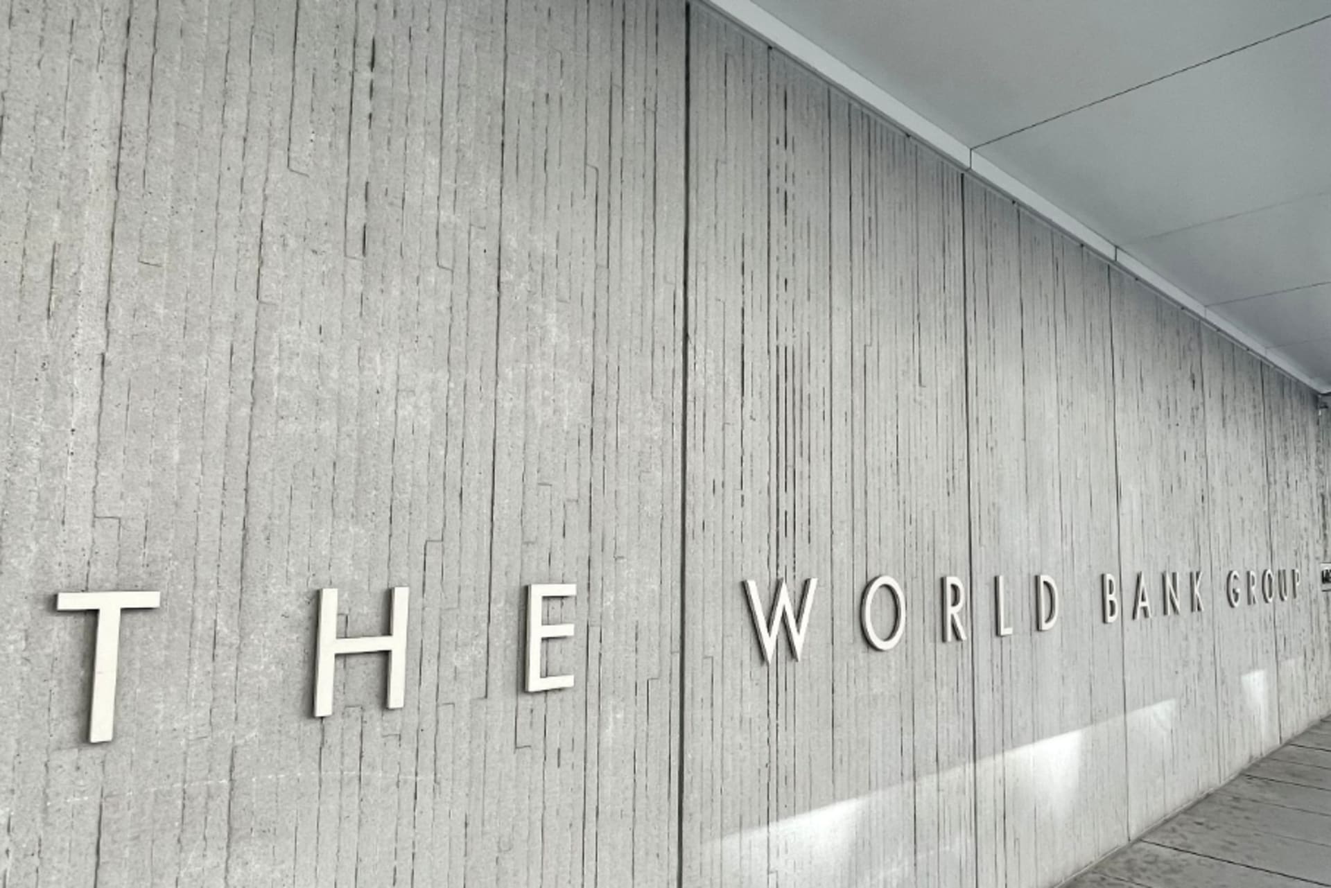 <p>The World Bank Group logo is seen on the institution’s building in Washington, DC.</p>
