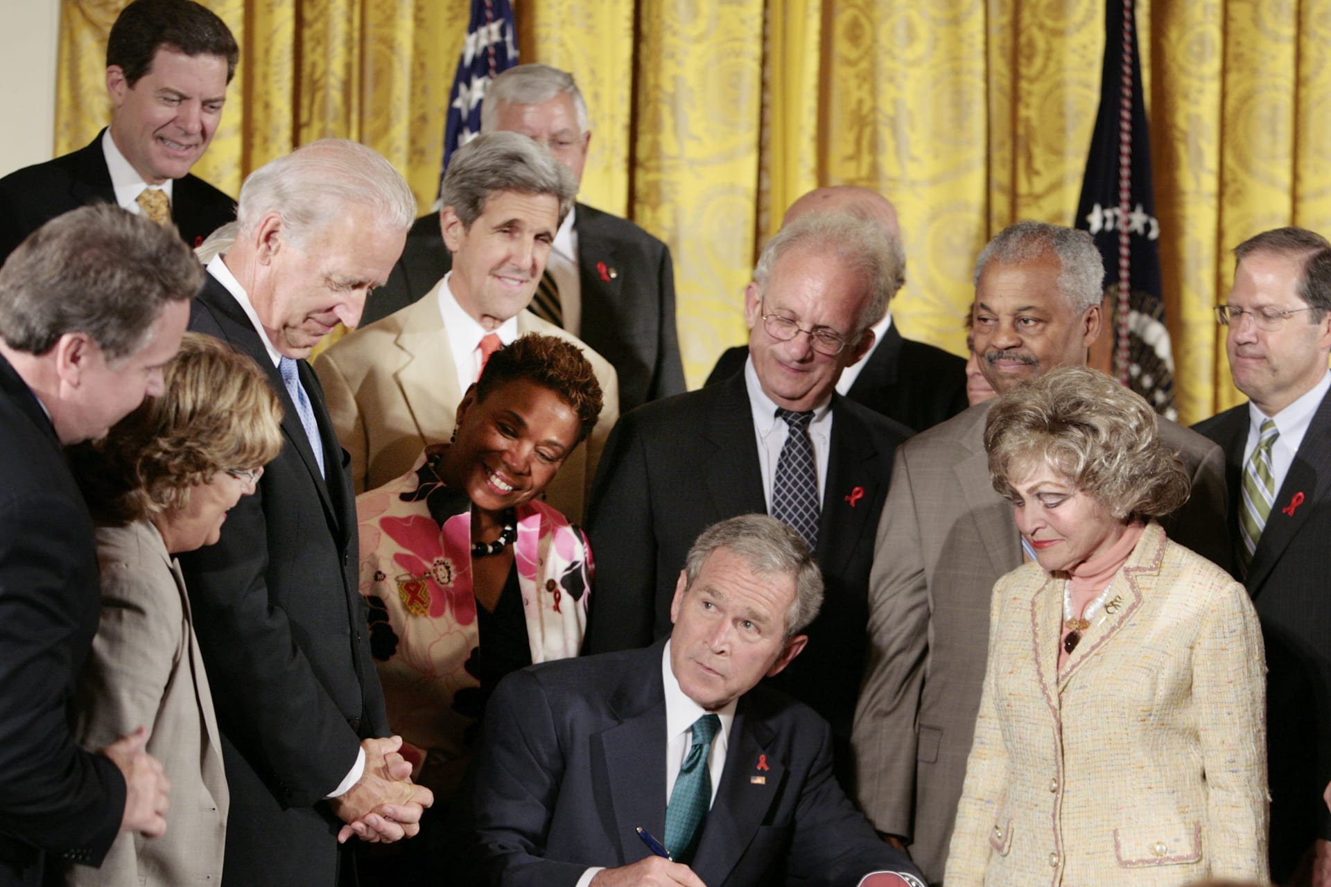 <p>U.S. President George W. Bush signs H.R. 5501, the Tom Lantos and Henry J. Hyde United States Global Leadership Against HIV/AIDS, Tuberculosis, and Malaria Reauthorization Act of 2008, in the East Room of the White House on July 30, 2008.</p>