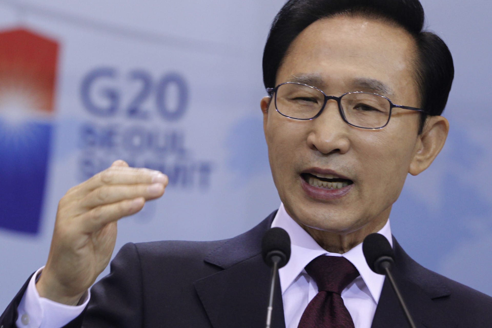 <p>South Korean President Lee Myung-bak answers a reporter’s question during a news conference regarding the upcoming G20 Summit at the presidential Blue House in Seoul on November 3, 2010.</p>
