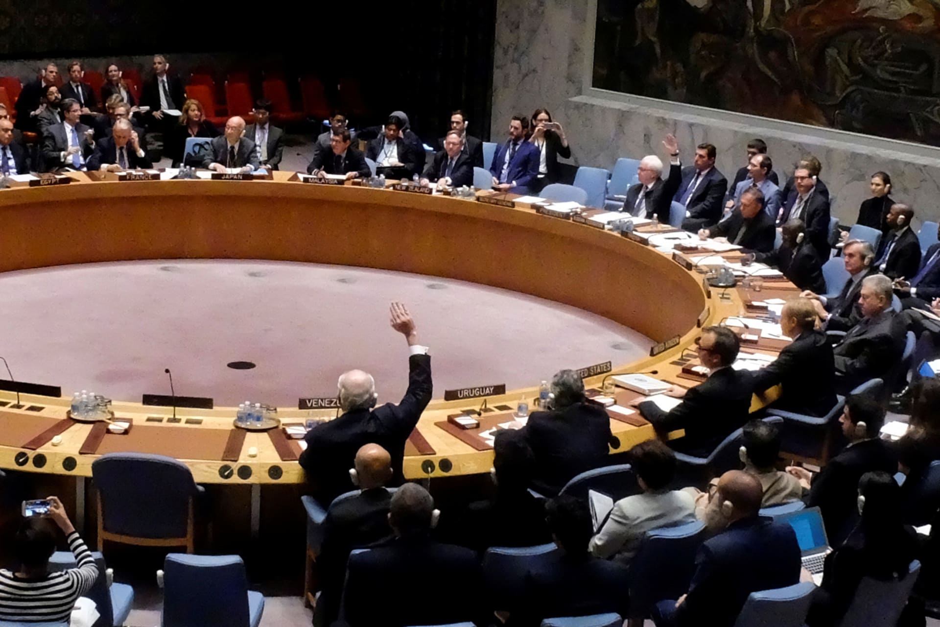 <p>Russia Ambassador Vitaly Churkin and Venezuelan Ambassador Rafael Ramirez vetoes a draft resolution that demands an immediate end to air strikes and military flights over Syria’s Aleppo city, at the U.N. Headquarters in New York, on October 8, 2016.</p>

