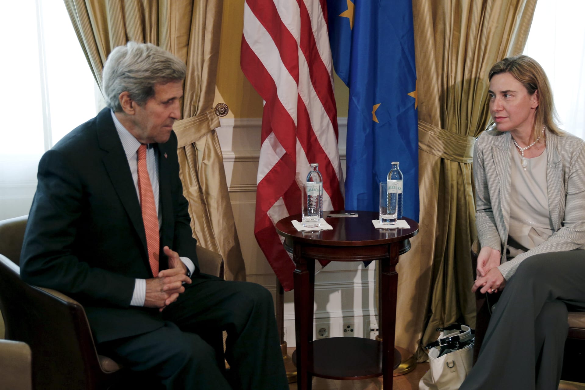 <p>U.S. Secretary of State John Kerry (L) meets with European Union foreign policy chief Federica Mogherini at a hotel where the Iran nuclear talks meetings are being held in Vienna, Austria, on July 2, 2015.</p>
