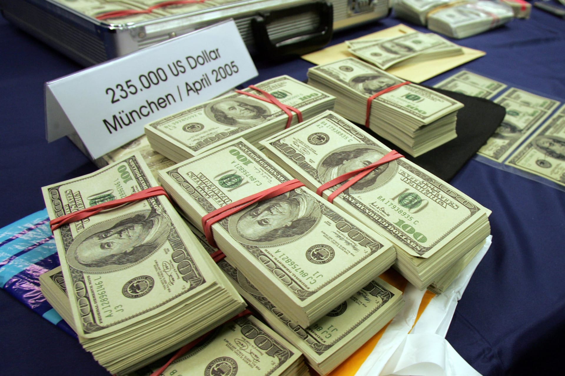 <p>A mass of forged U.S. one hundred dollar bills are on display at the Bavarian criminal investigation department in Munich, southern Germany, on Friday, Sept. 23, 2005.</p>
