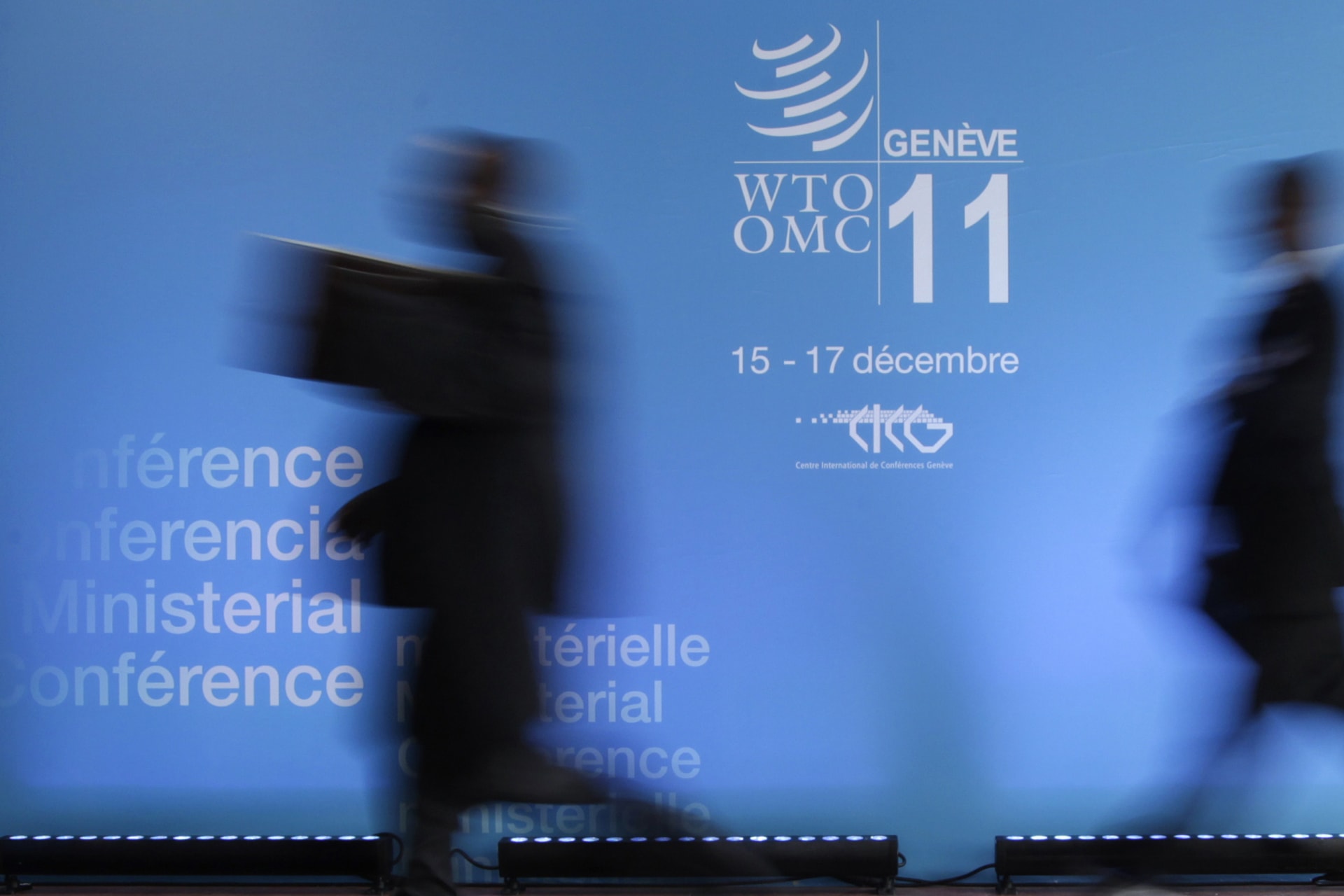 <p>Delegates arrive at the 8th World Trade Organization Ministerial Conference in Geneva on December 15, 2011.</p>
