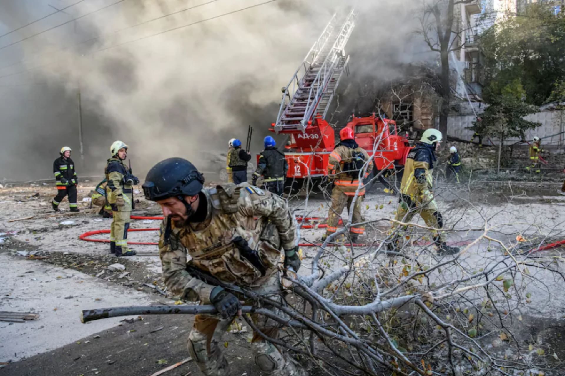 <p>Firefighters help evacuate a residential building destroyed by a Russian drone strike in Kyiv on Oct. 17. </p>
