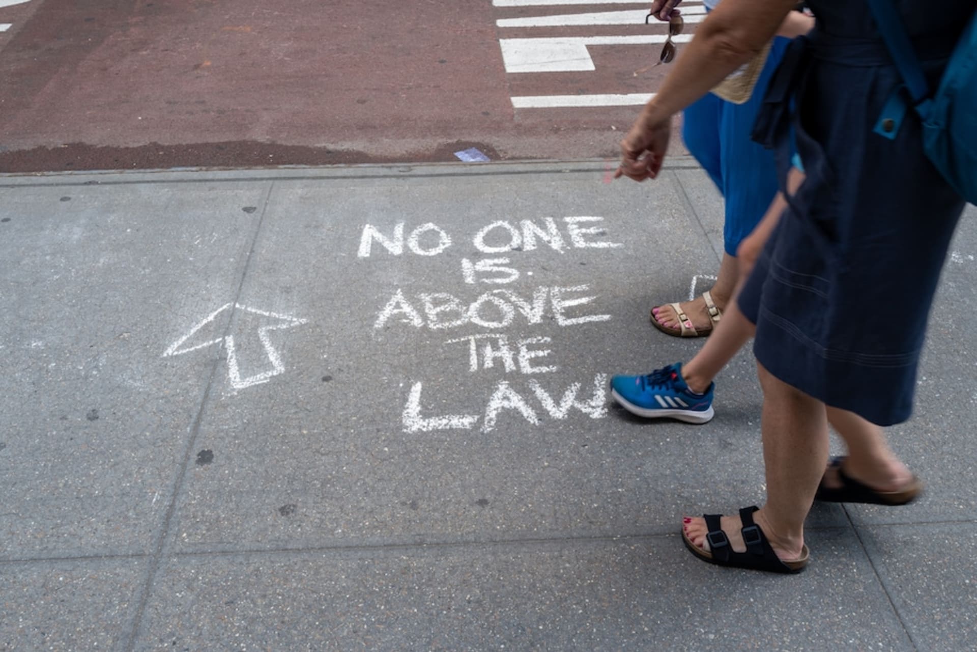 <p>People walk near Trump Tower in Manhattan on Aug. 10 in New York. </p>
