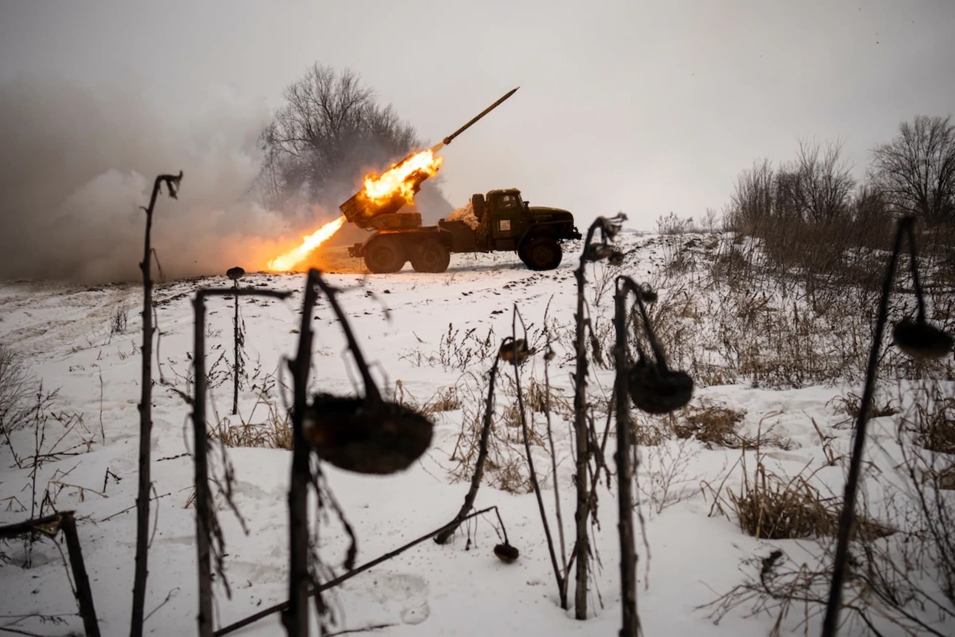 <p>Ukrainian military personel fire a Soviet-era Grad multiple rocket launcher at Russian positions in the Kharkiv area in Ukraine in February.</p>
