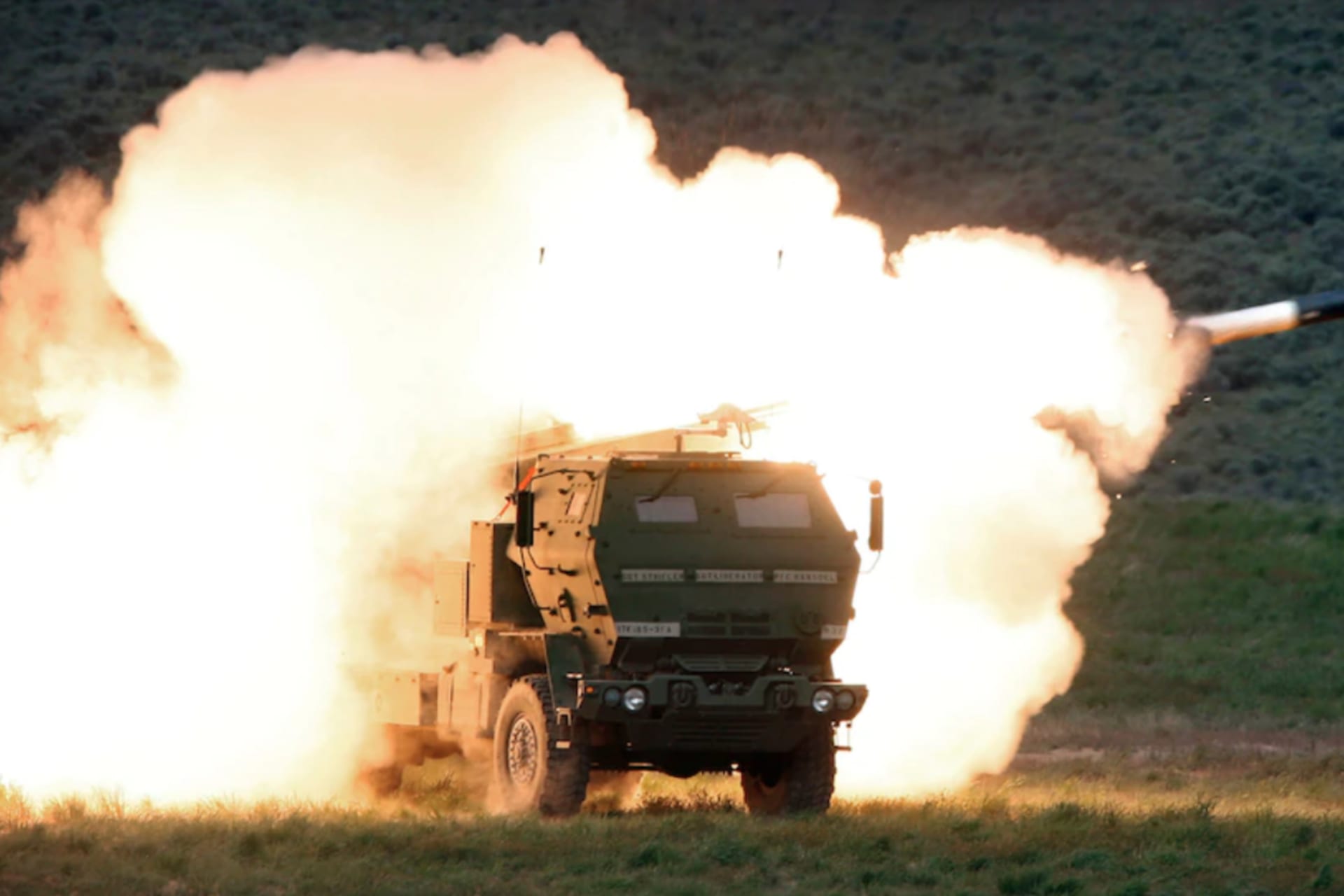 <p>A launch truck fires a High Mobility Artillery Rocket System (HIMARS) during combat training at the Yakima Training Center in Washington on May 23, 2011. </p>