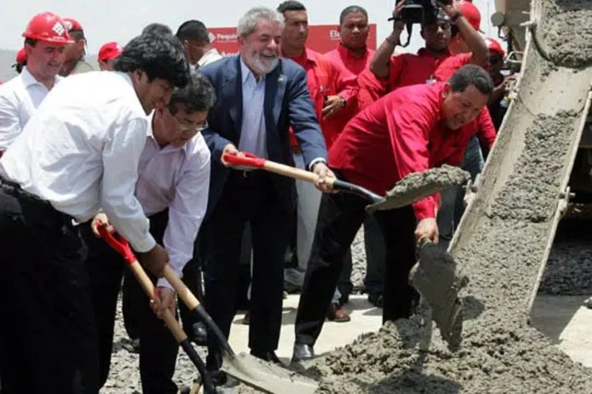 The Bolivian and Brazilian presidents and Chavez at a plant opening.
