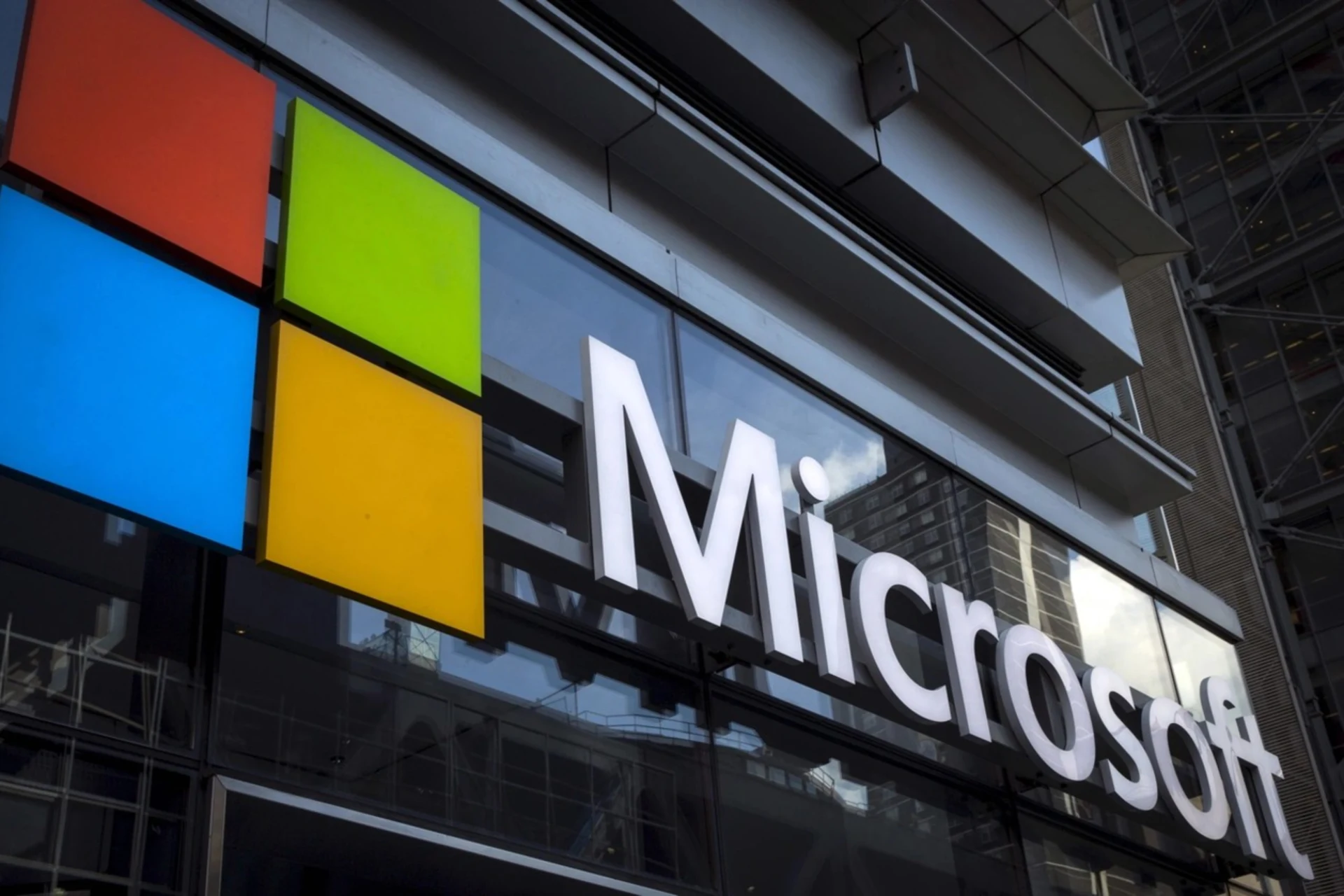 A Microsoft logo is seen on an office building in New York City.