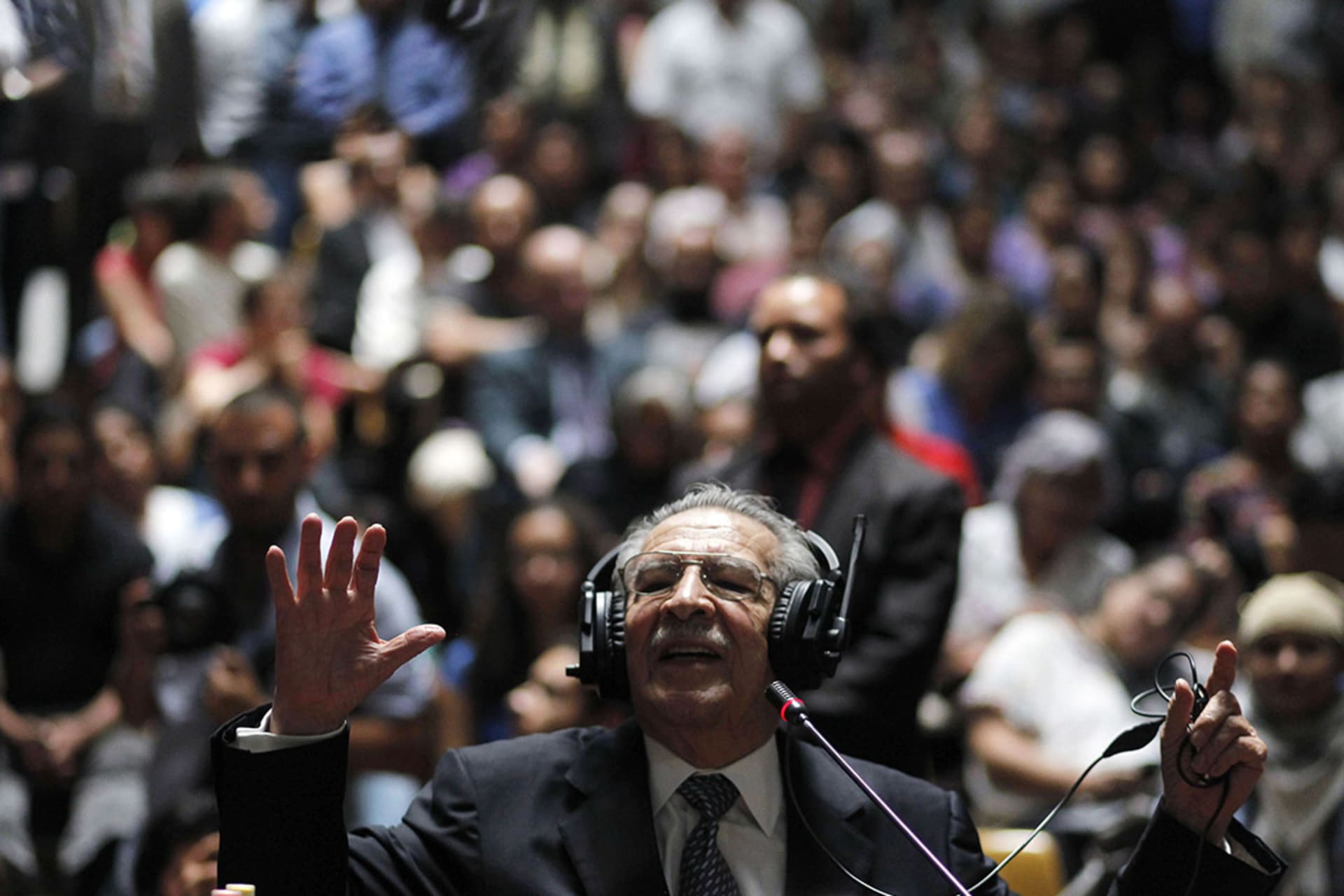 Former Guatemalan President Efrain Rios Montt speaks during his trial at the Supreme Court of Justice in Guatemala City. 