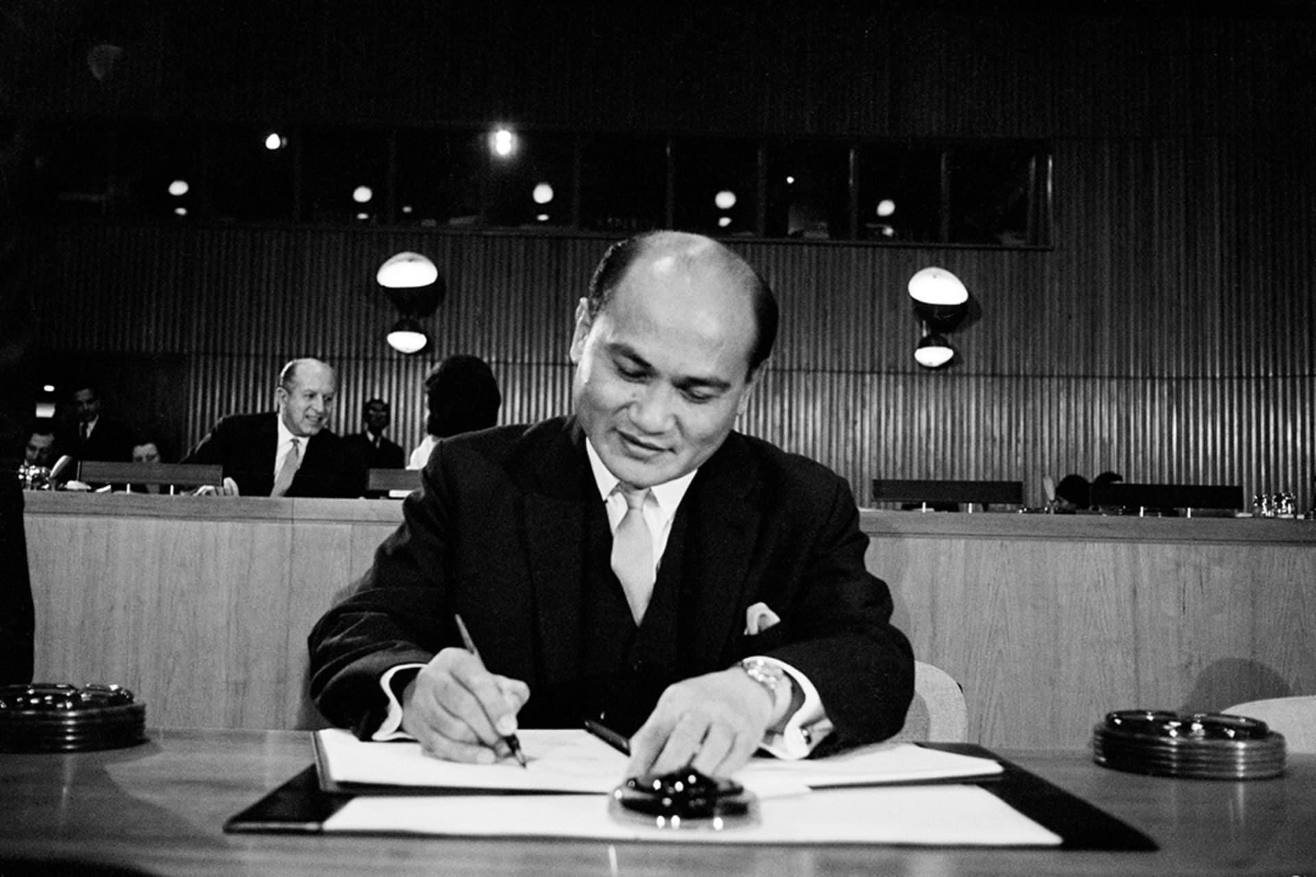 Salvador P. Lopez, Philippine ambassador to the United States, signs the Covenants at the UN headquarters in New York, December 1966. Teddy Chen/UN Photo
