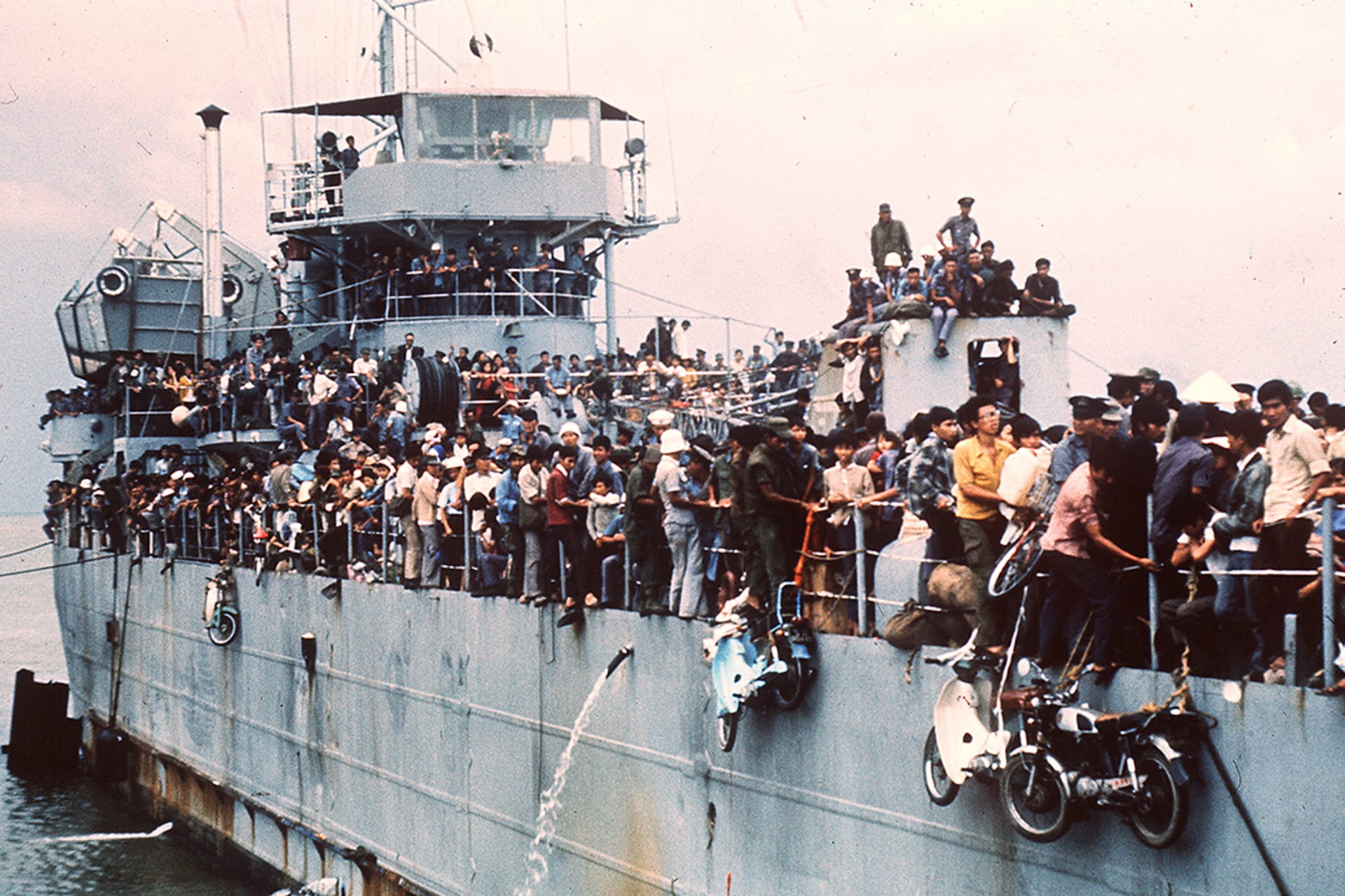 More than seven thousand refugees on a South Vietnamese Navy ship arrive at Vung Tau port in South Vietnam. AFP/Getty Images
