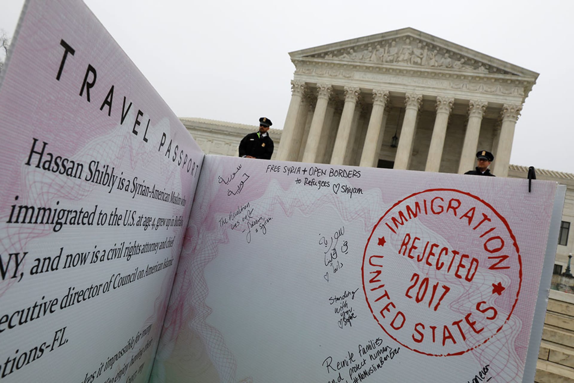 A mock-up of a Muslim traveler’s passport is placed outside the U.S. Supreme Court. Yuri Gripas/Reuters