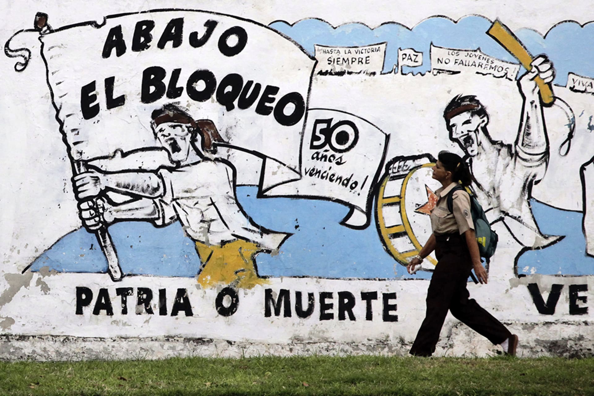 A mural in Havana reads, "Down with the blockade," referring to the fifty-year U.S. embargo. 
