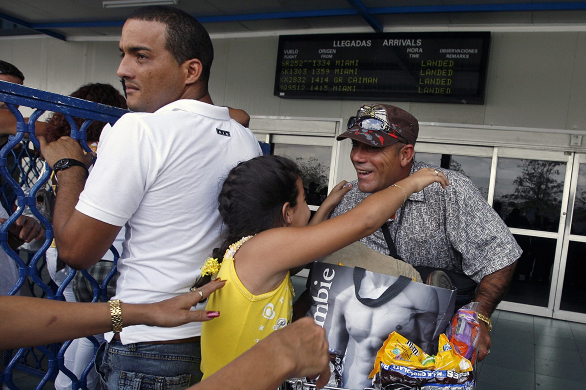 Cubans welcome relatives arriving from the United States. 
