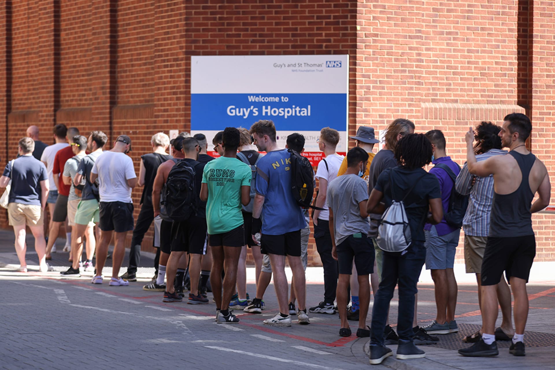 People line up to receive smallpox vaccinations at Guy’s Hospital in London amid a monkeypox outbreak in July 2022. Hollie Adams/Getty Images