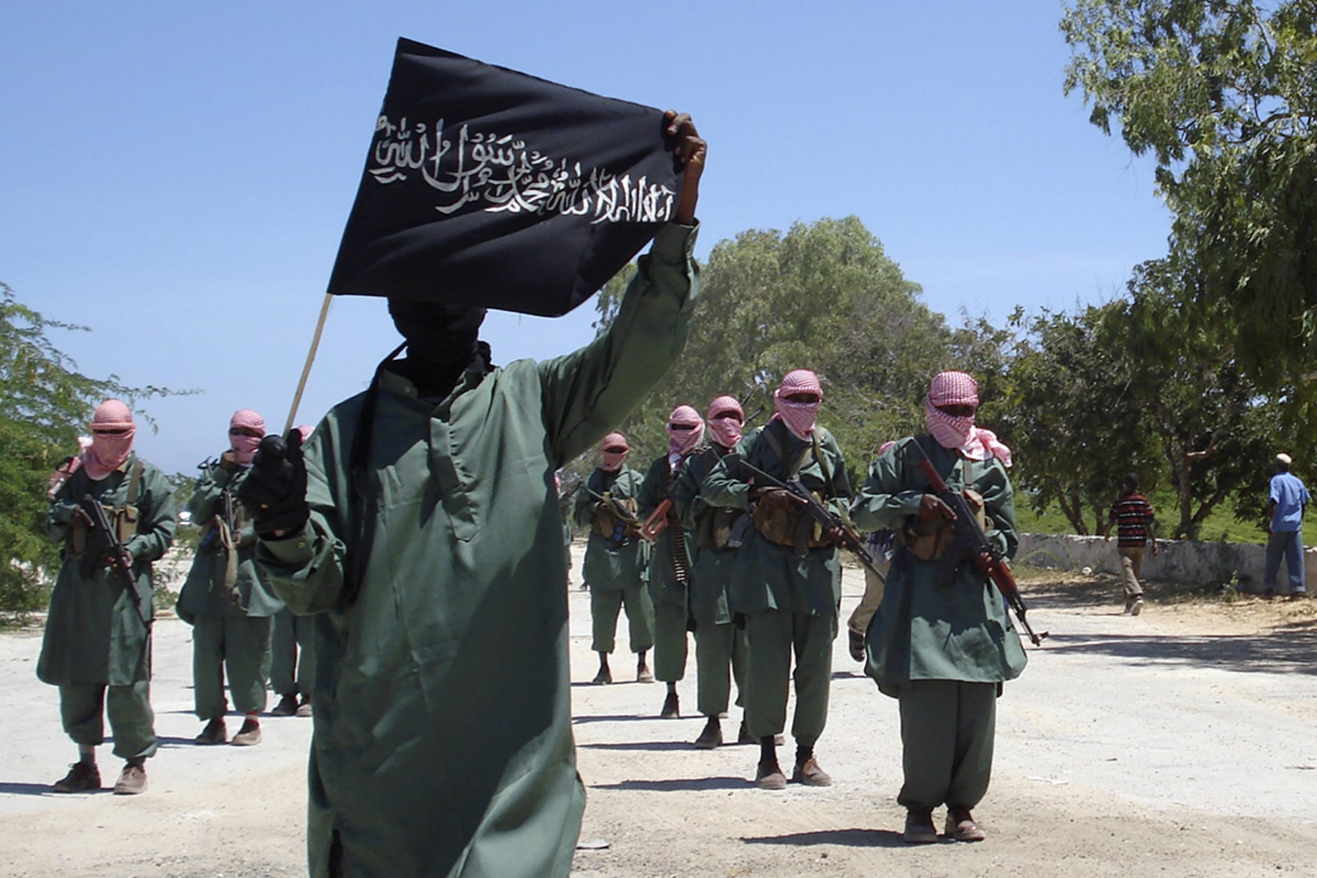 Al-Shabaab fighters march on the outskirts of Mogadishu. Mowliid Ibdi/Reuters
