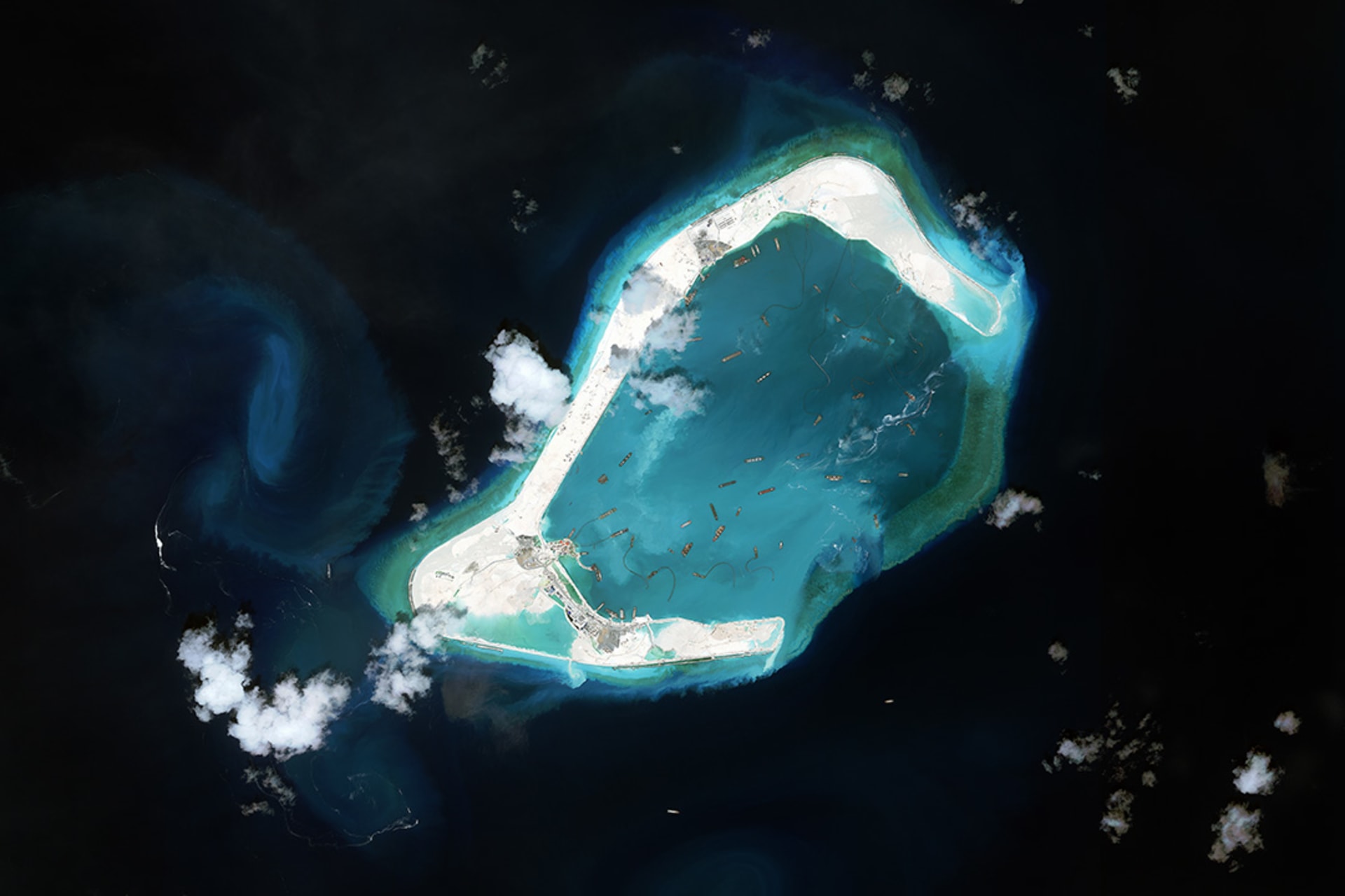 China develops land on Subi Reef in the Northern Spratly islands, June 2015. 
